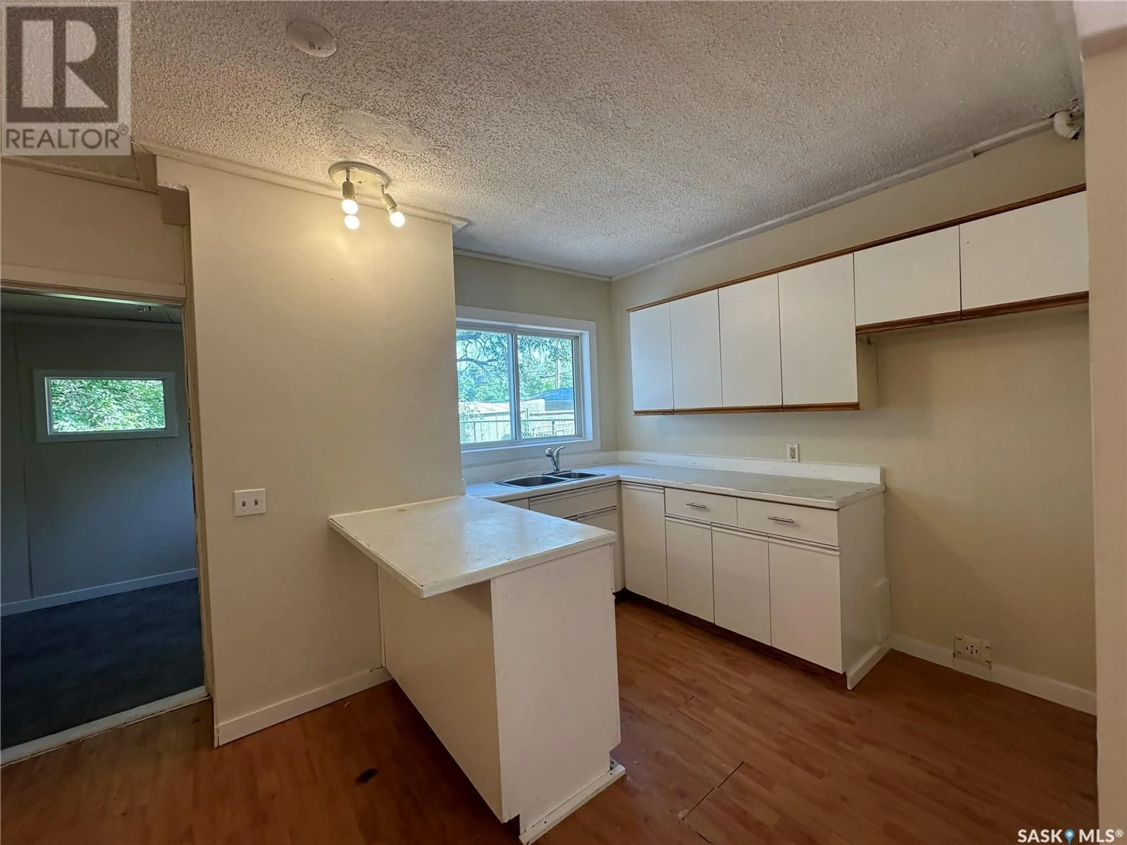 A pic of a room, wood floors for 745 Athol STREET, Regina Saskatchewan S4T3B4