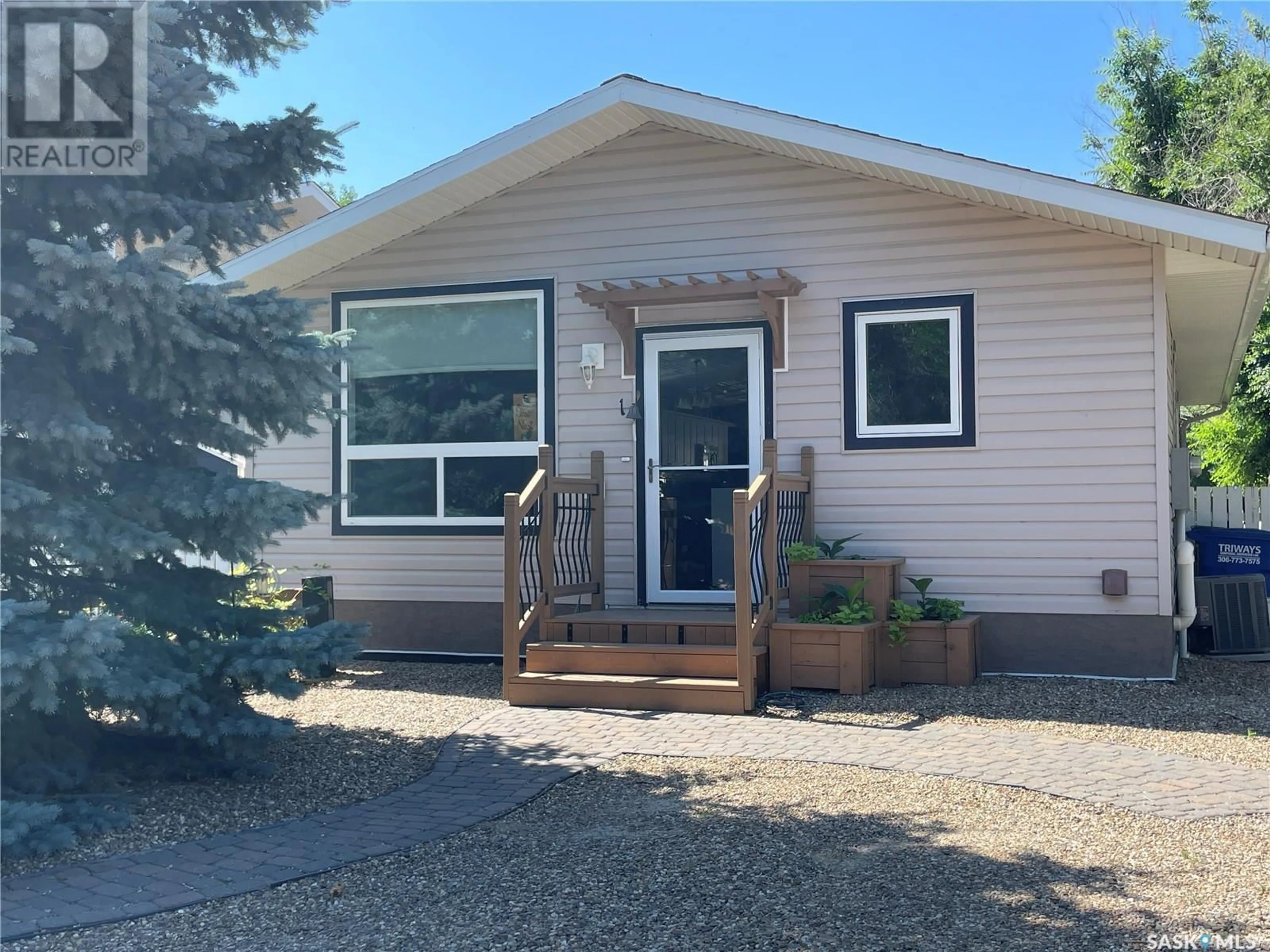 Home with vinyl exterior material for 1 1st AVENUE, Maple Creek Saskatchewan S0N1N0