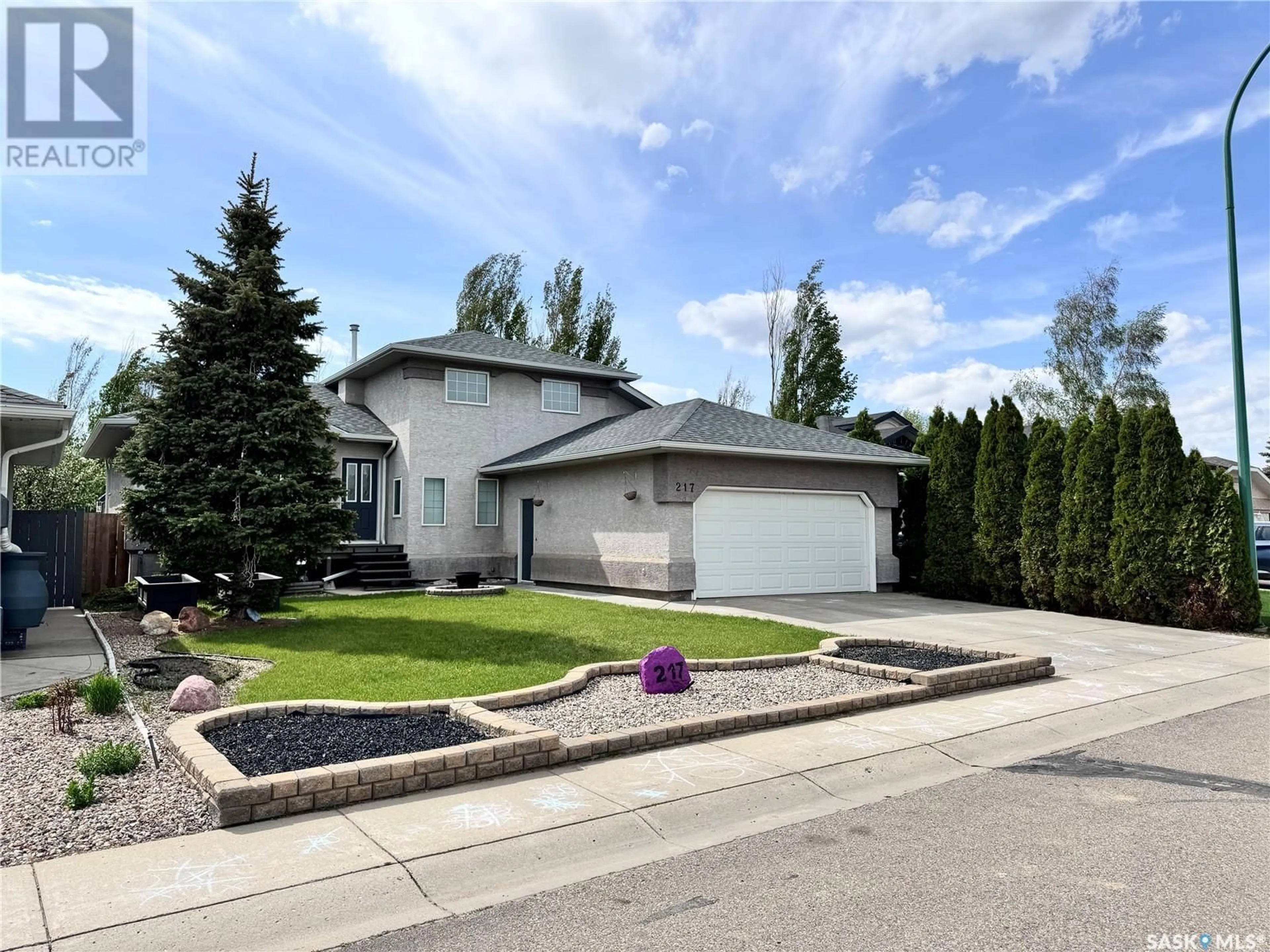 Frontside or backside of a home for 217 McKay COURT, Warman Saskatchewan S0K4S0