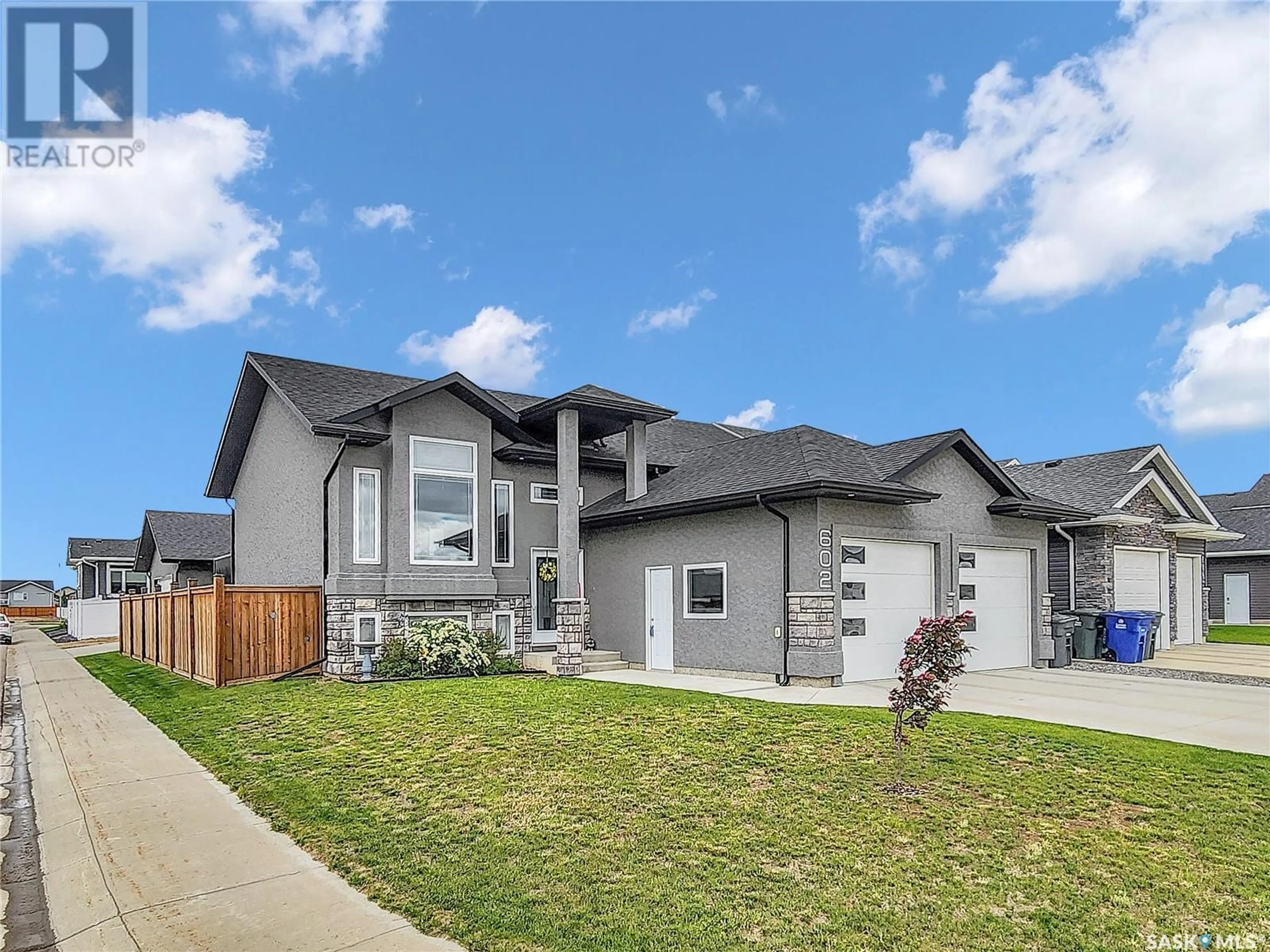 Frontside or backside of a home for 602 Pebble Beach BOULEVARD, Warman Saskatchewan S0K4S4