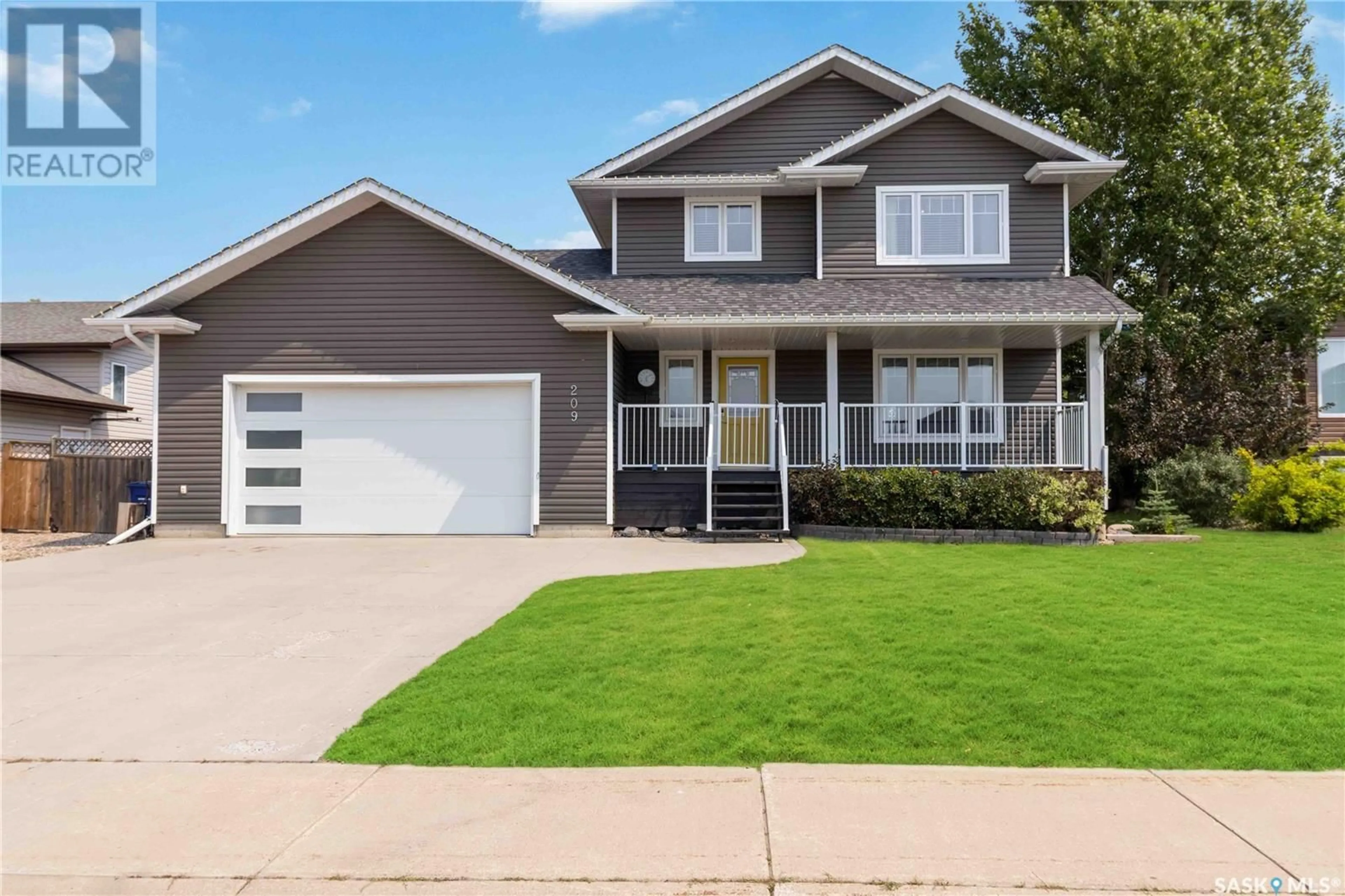 Frontside or backside of a home for 209 Diefenbaker AVENUE, Hague Saskatchewan S0K1X0