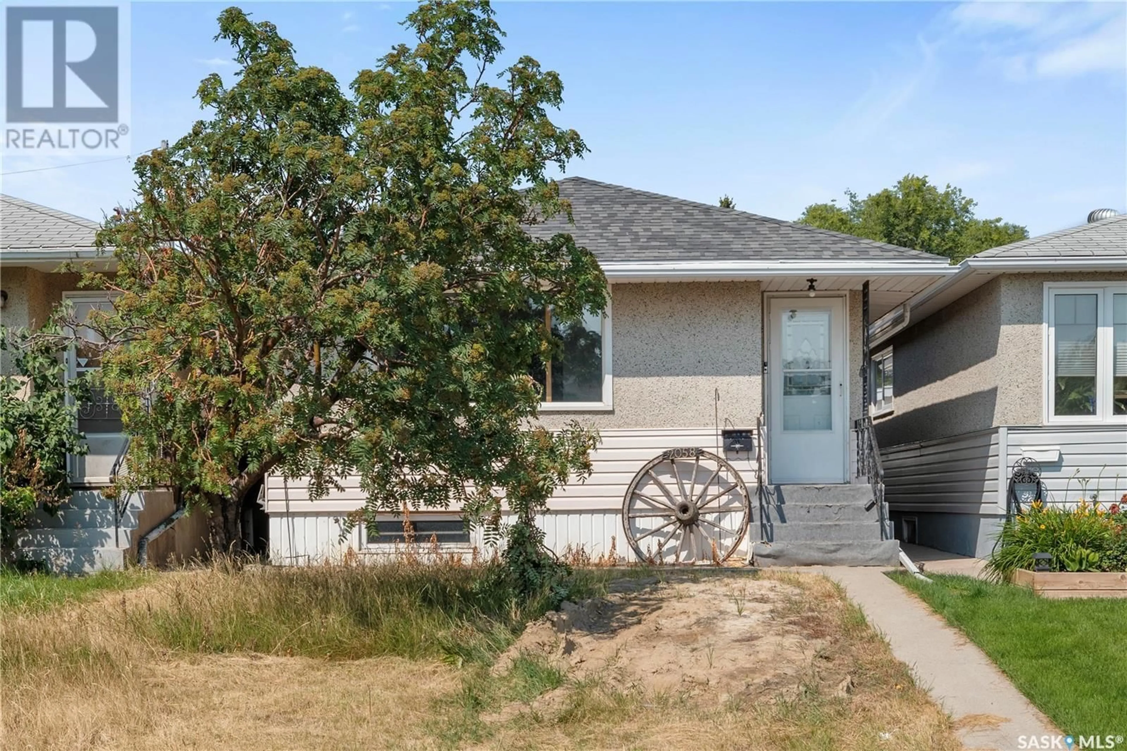 Frontside or backside of a home for 2058 Mcara STREET, Regina Saskatchewan S4N2V6