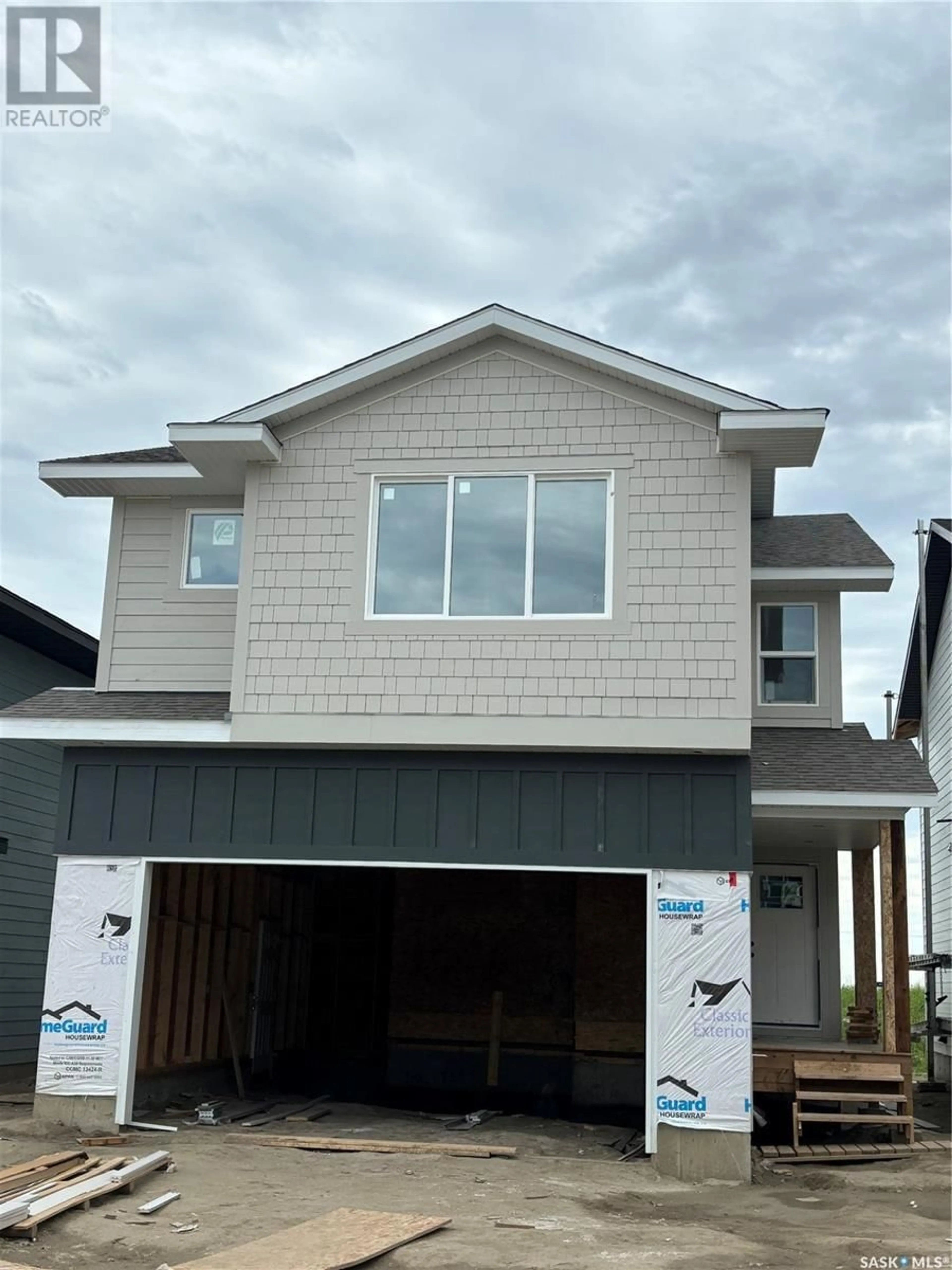 Frontside or backside of a home for 166 Kostiuk CRESCENT, Saskatoon Saskatchewan S7W0P6