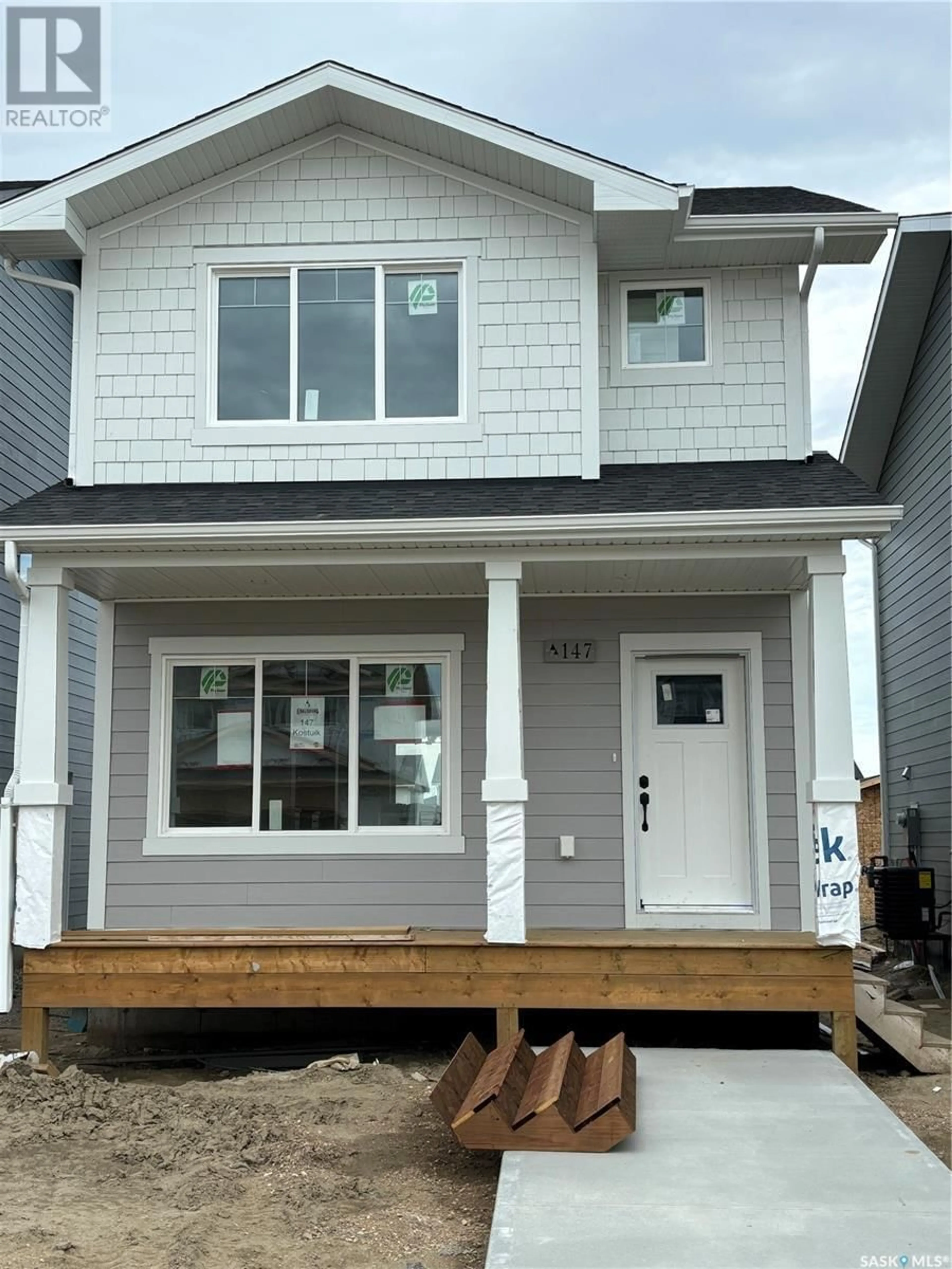 Home with vinyl exterior material for 147 Kostiuk CRESCENT, Saskatoon Saskatchewan S7V1R8