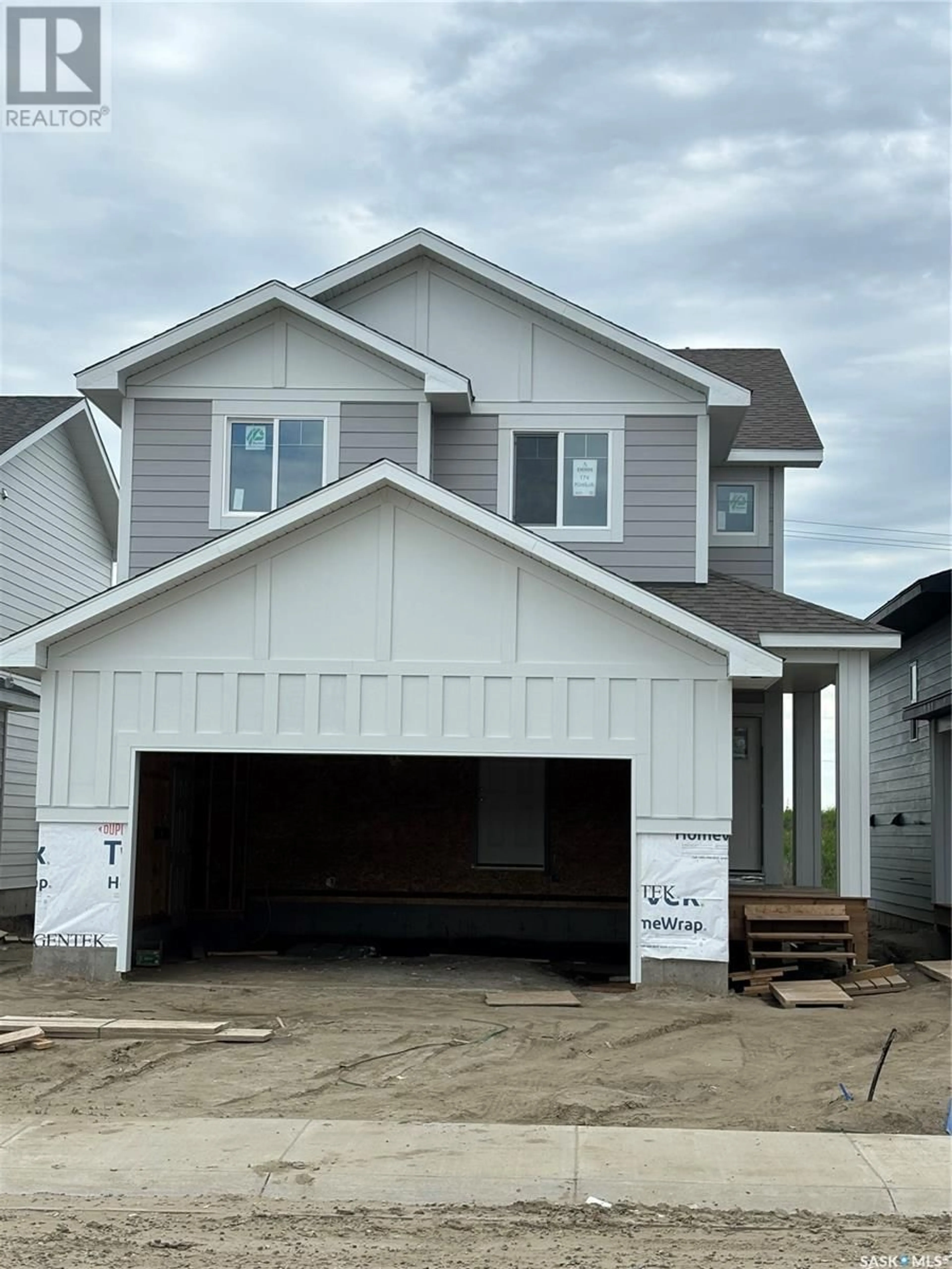 Frontside or backside of a home for 174 Kostiuk CRESCENT, Saskatoon Saskatchewan S7W0P6