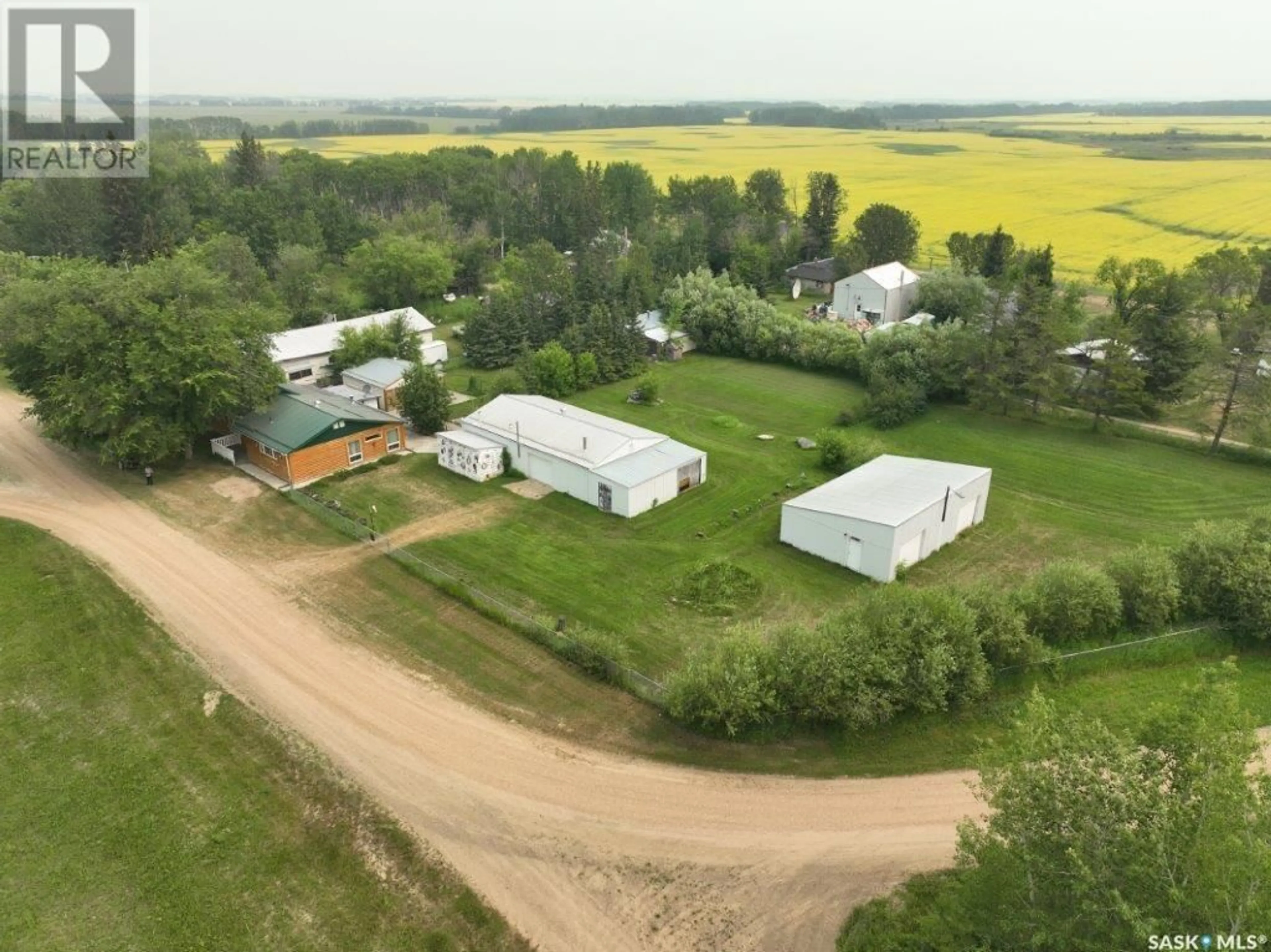 A pic from outside/outdoor area/front of a property/back of a property/a pic from drone, building for E - 36 1ST STREET, Weekes Saskatchewan S0E1V0