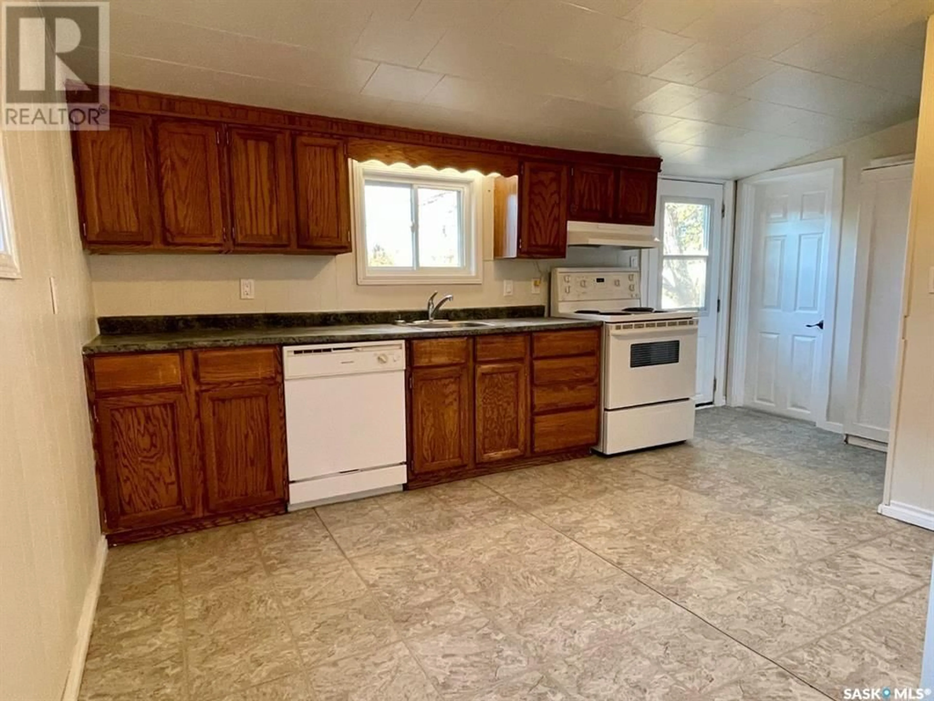 Standard kitchen, ceramic/tile floor for 210 5th AVENUE E, Biggar Saskatchewan S0K0M0