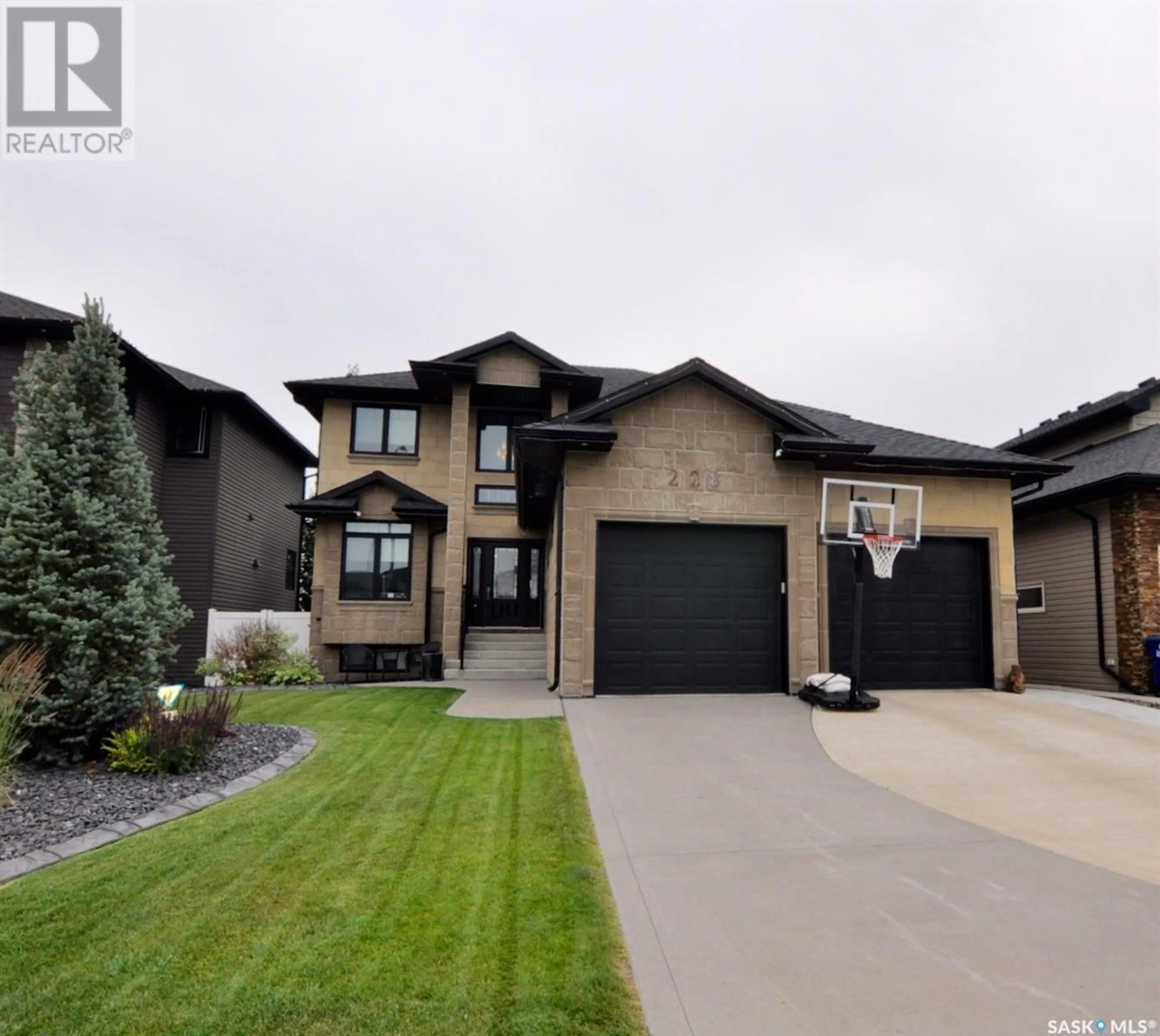 Frontside or backside of a home for 228 Kinsmen CRESCENT, Martensville Saskatchewan S0K0A2