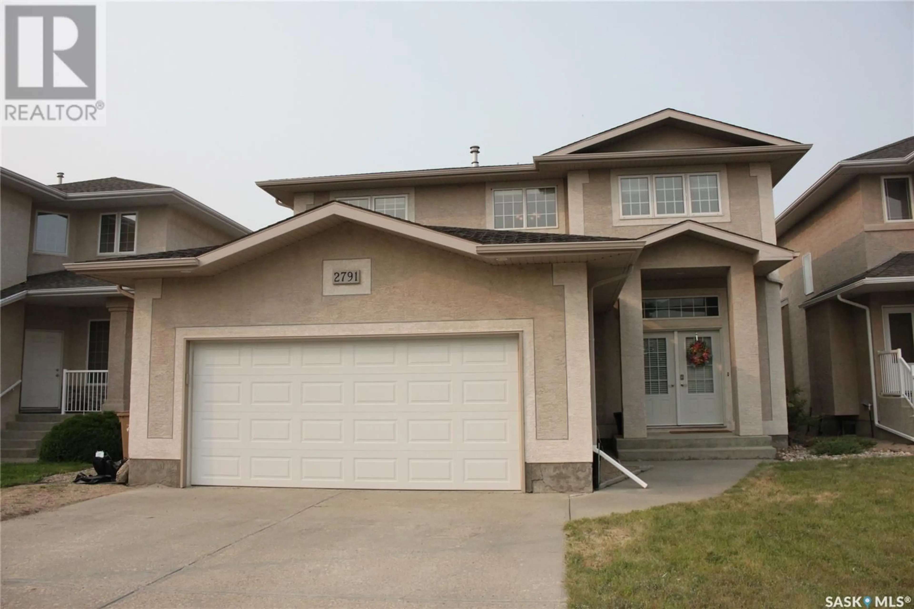 Frontside or backside of a home for 2791 Sandringham CRESCENT, Regina Saskatchewan S4V3C9