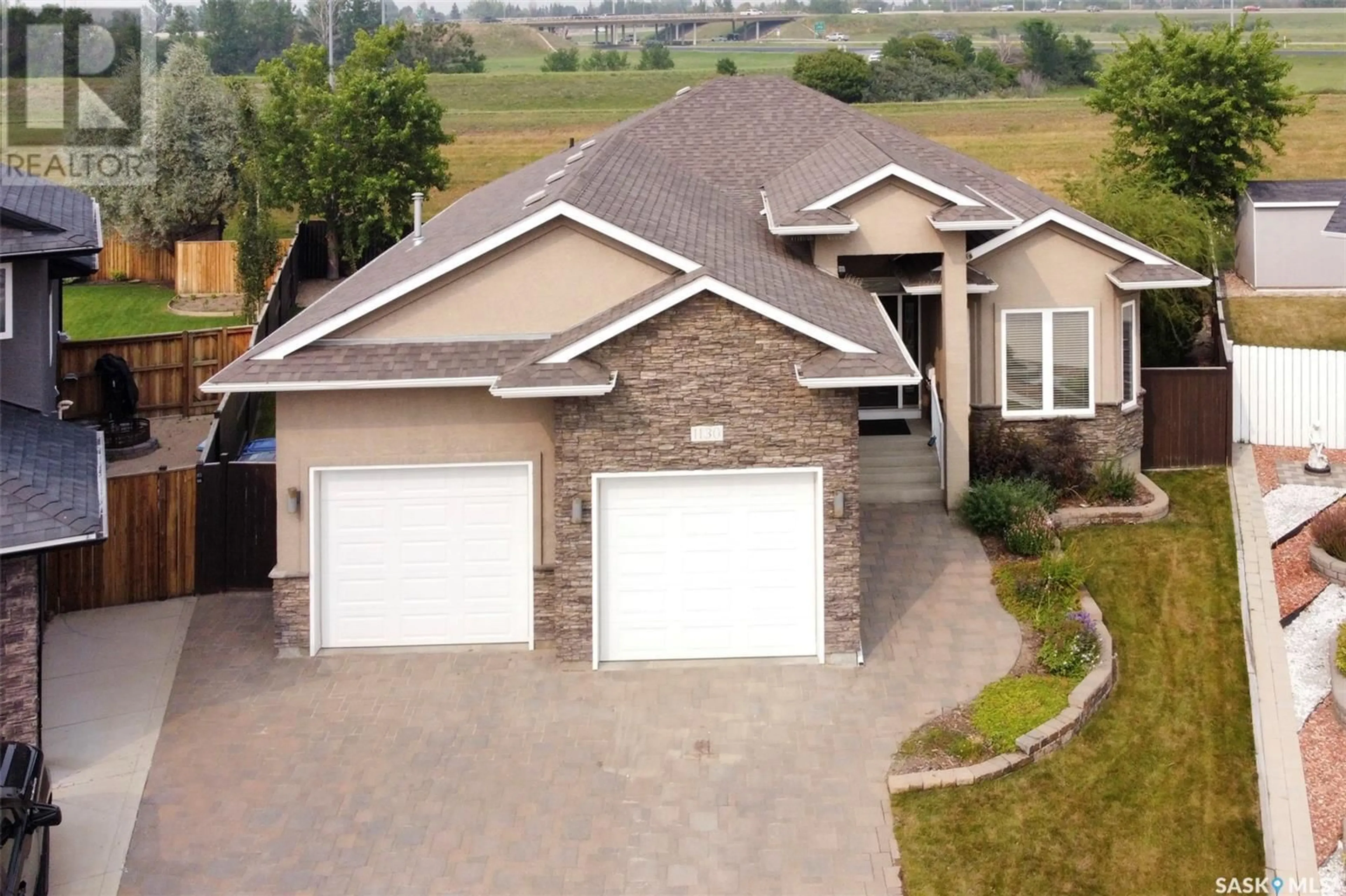 Frontside or backside of a home for 1130 Rempel PLACE, Saskatoon Saskatchewan S7T0M2