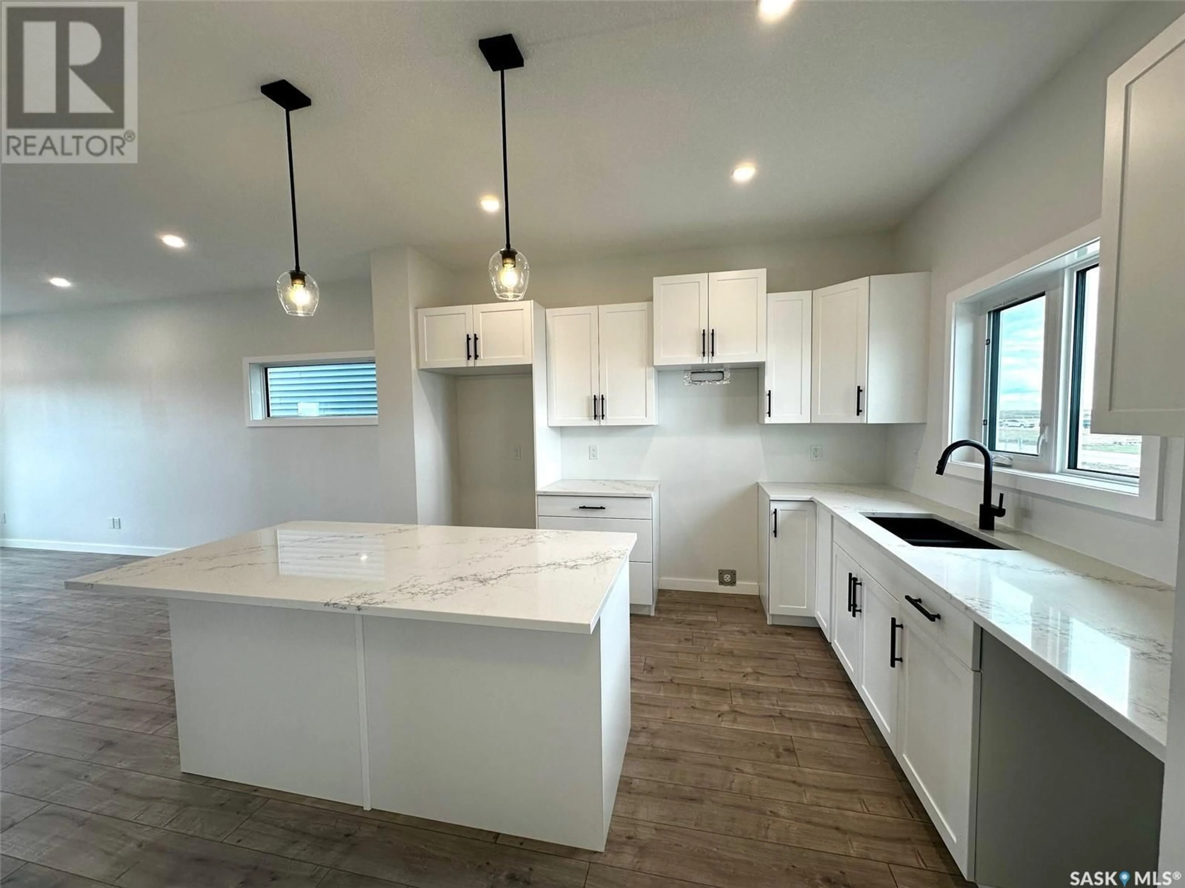 Open concept kitchen for 1127 Camden GARDENS, White City Saskatchewan S4L3R5