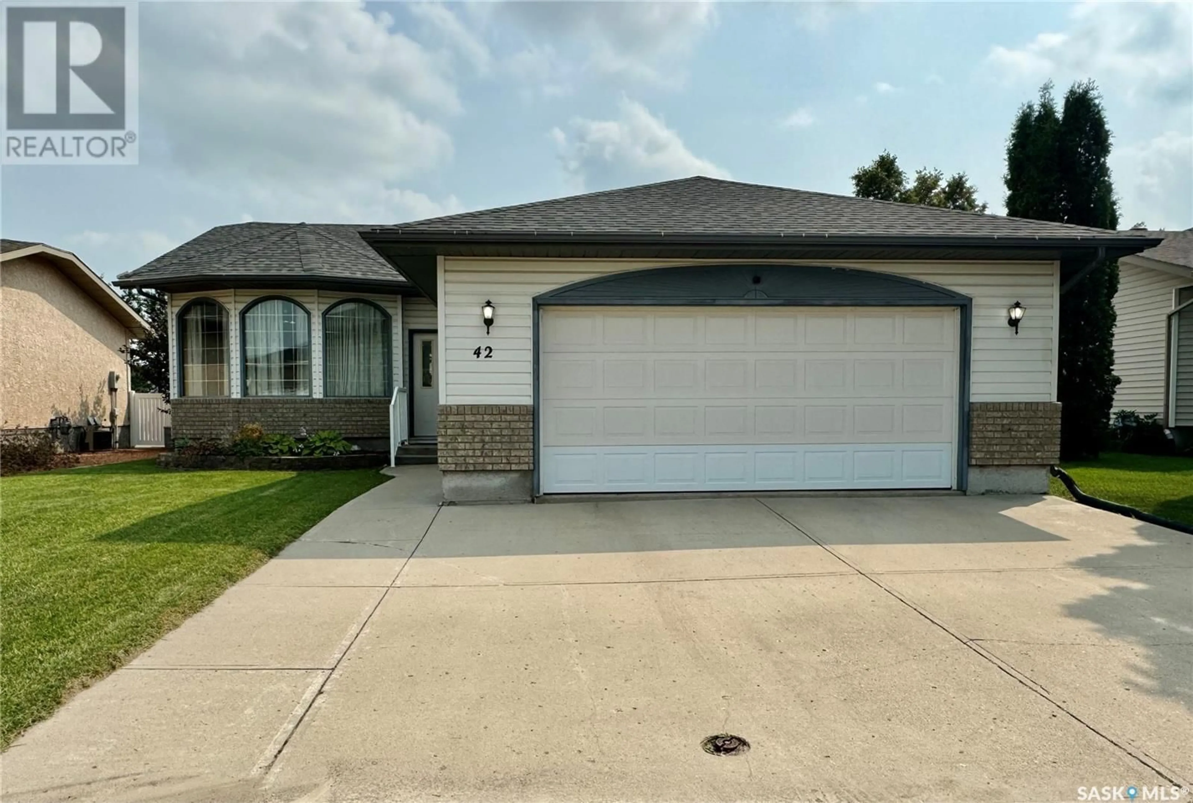 Frontside or backside of a home for 42 Caldwell DRIVE, Yorkton Saskatchewan S3N4A4