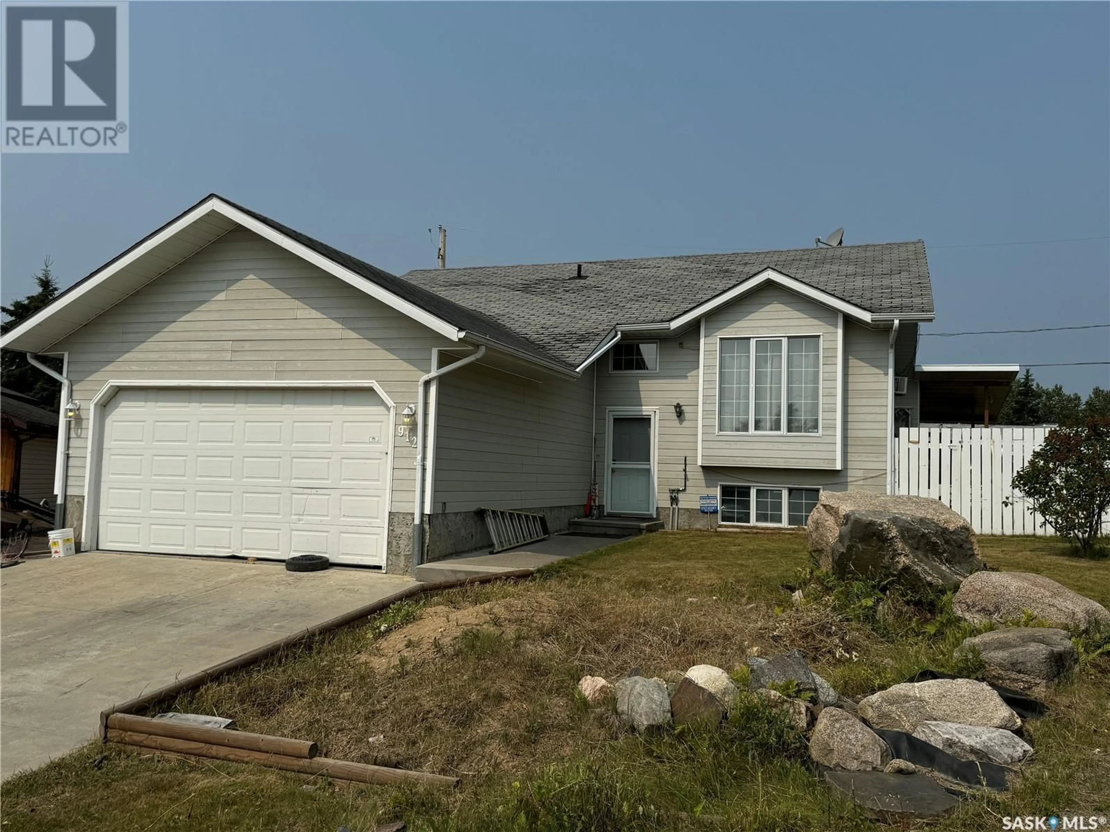 Frontside or backside of a home for 912 Aronec PLACE, La Ronge Saskatchewan S0J1L0