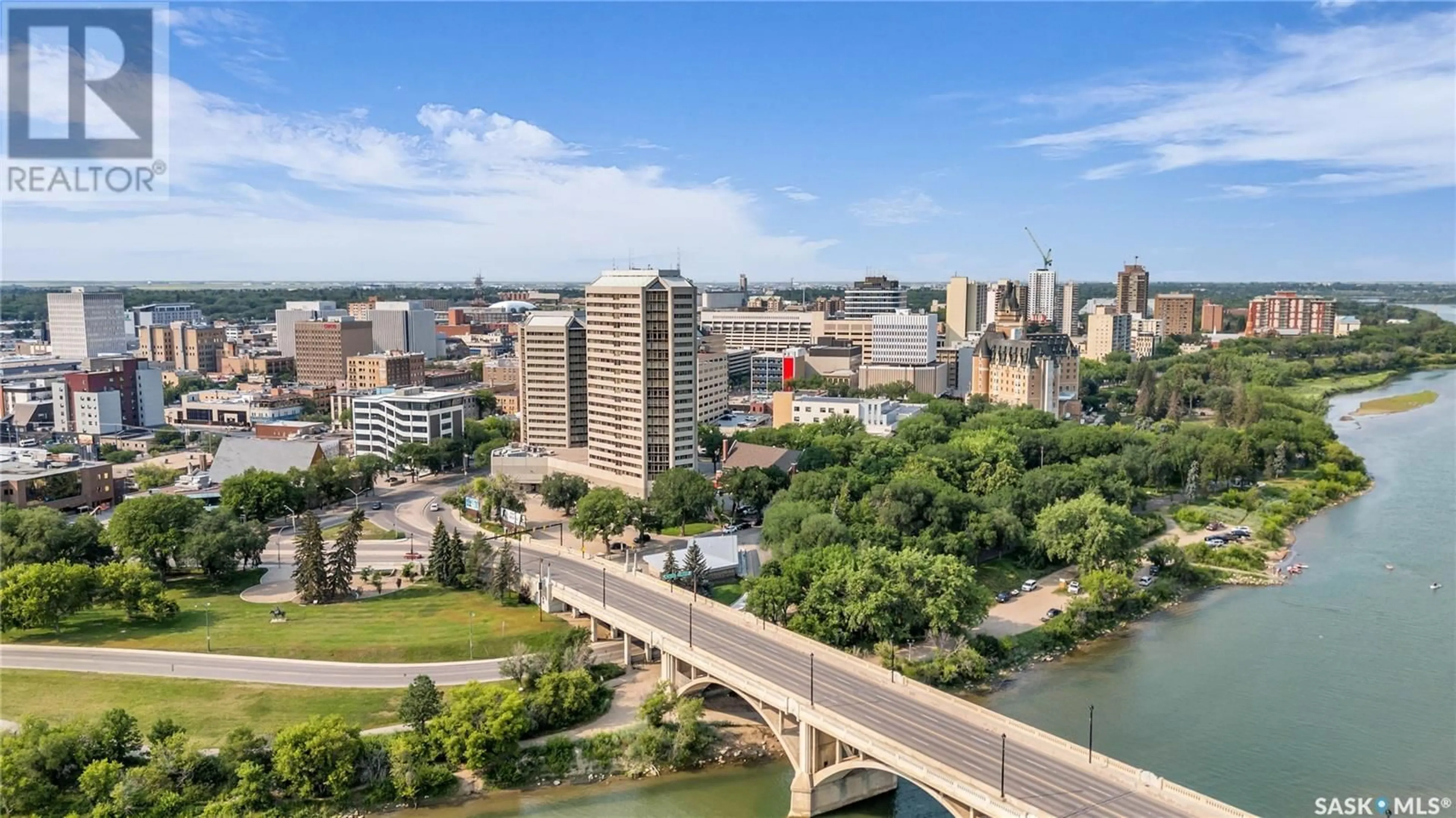 A pic from exterior of the house or condo, the view of city buildings for 860 424 Spadina CRESCENT E, Saskatoon Saskatchewan S7K6X7