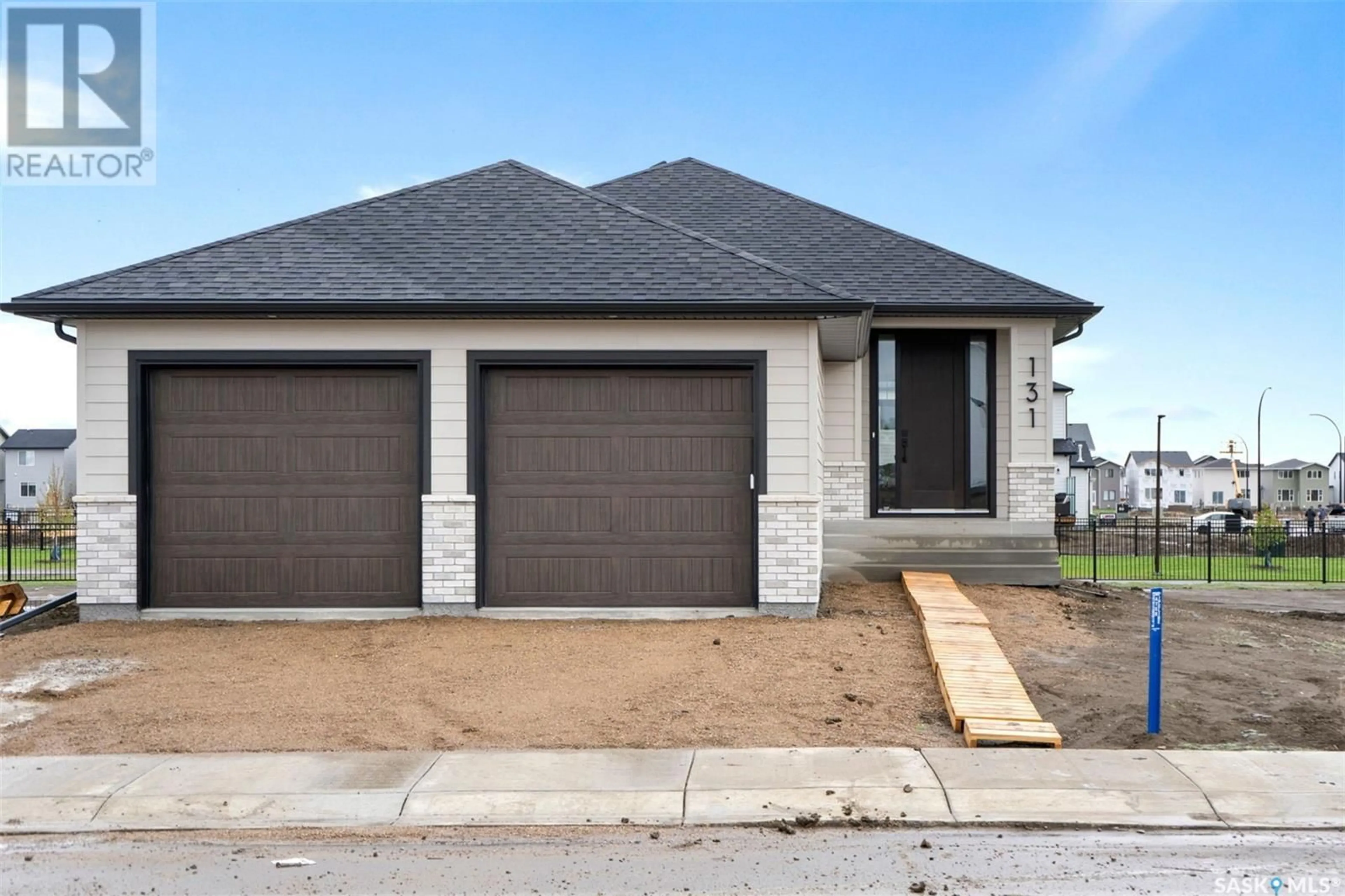 Frontside or backside of a home for 131 Katz STREET, Saskatoon Saskatchewan S7V1S8
