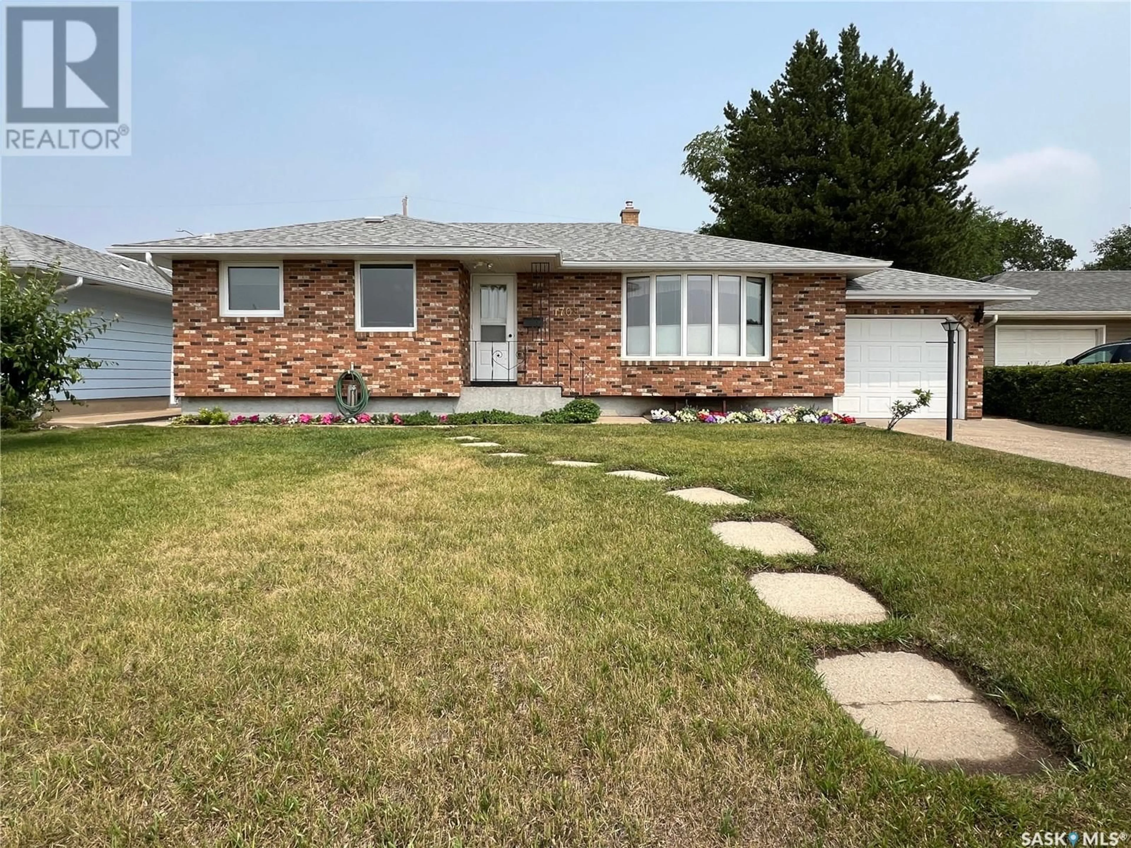 Frontside or backside of a home for 1709 1st STREET, Estevan Saskatchewan S4A0H5