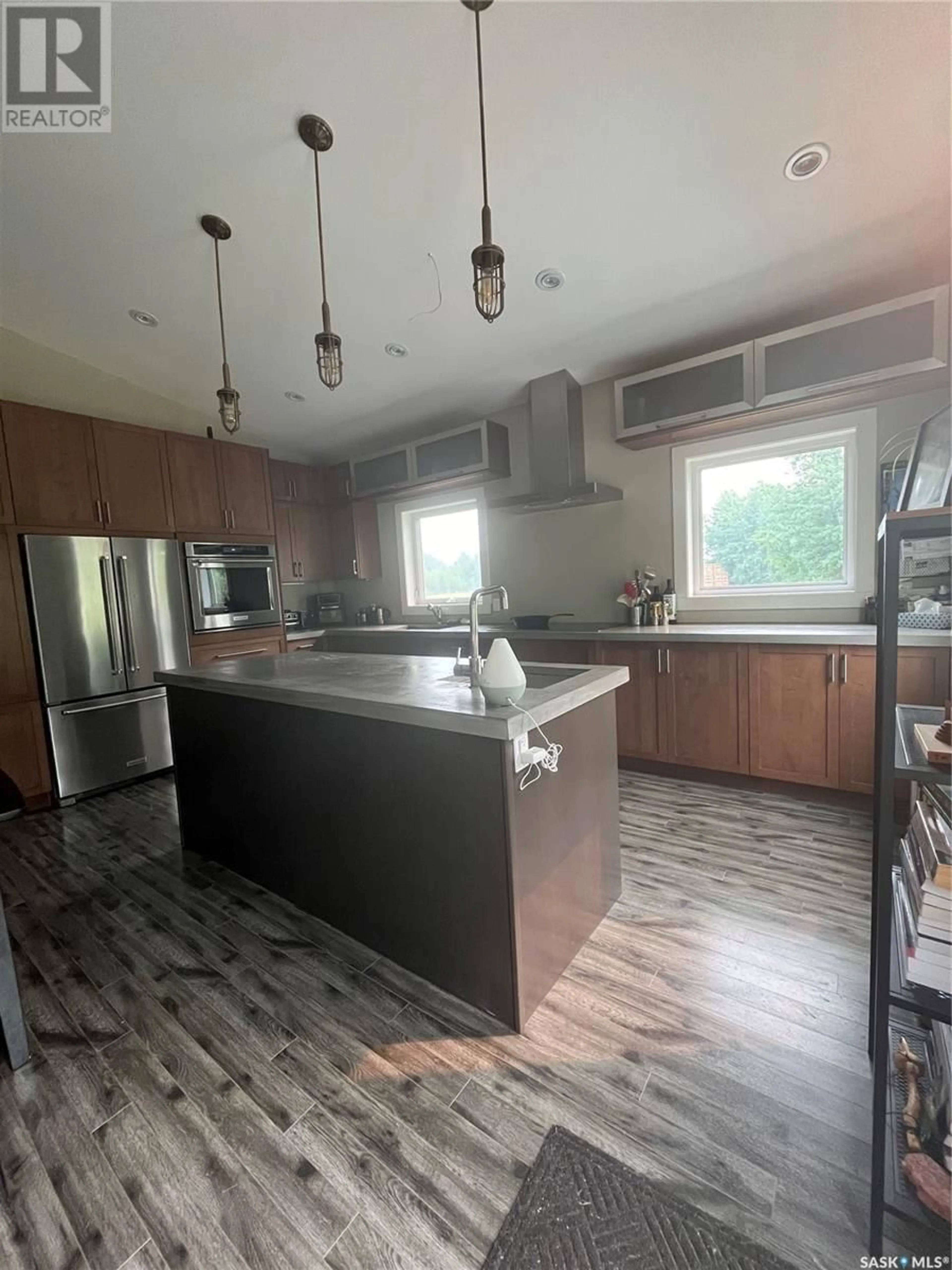Open concept kitchen, wood/laminate floor for MARTENS ACREAGE, Duck Lake Rm No. 463 Saskatchewan S0K1J0