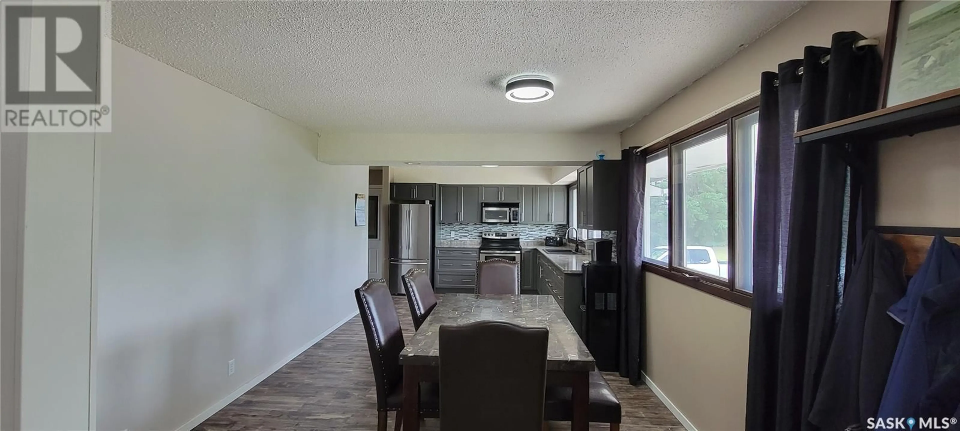 Dining room, wood floors, cottage for Schneider Acreage, Eye Hill Rm No. 382 Saskatchewan S0L2C0