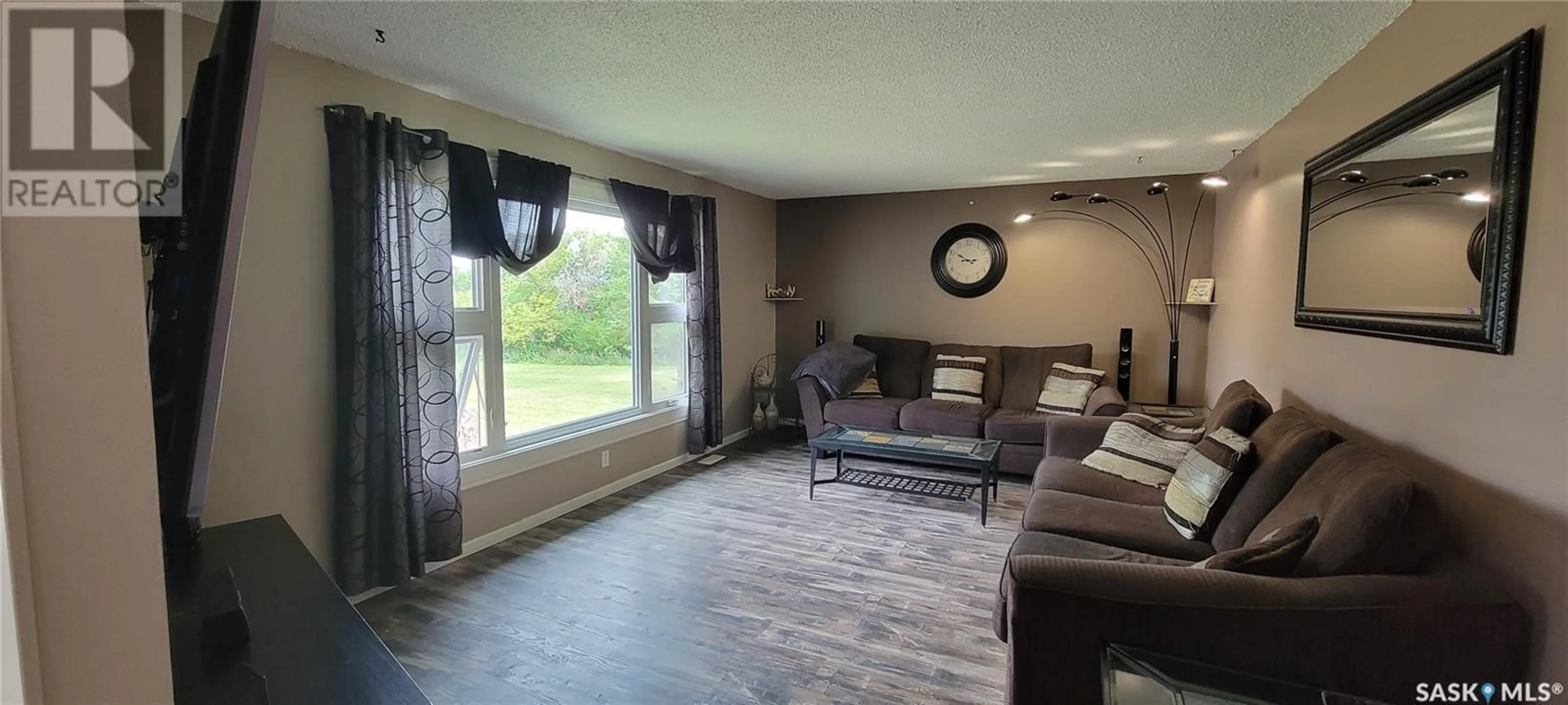 Living room, wood floors for Schneider Acreage, Eye Hill Rm No. 382 Saskatchewan S0L2C0