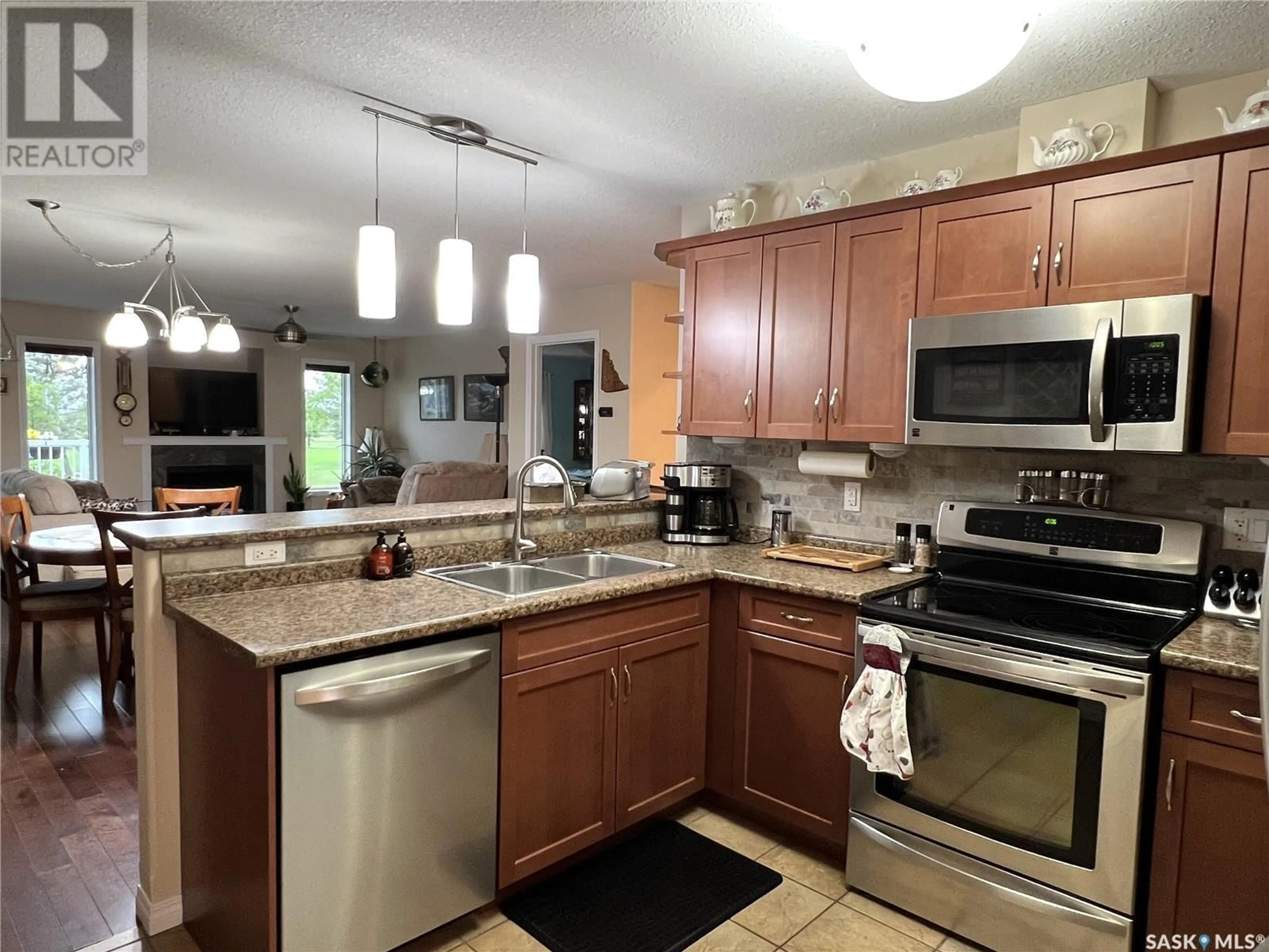 Open concept kitchen for 11 Fairway COURT, Meadow Lake Saskatchewan S9X1Z9