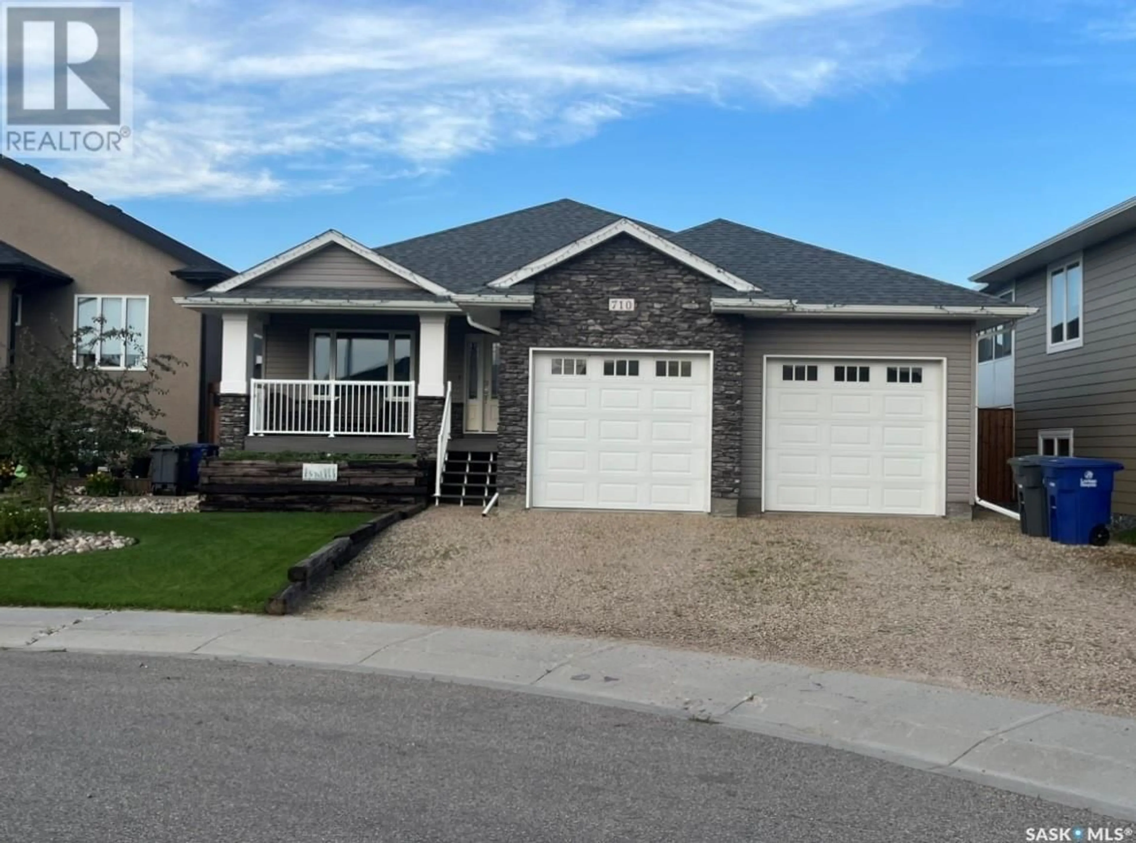 Frontside or backside of a home for 710 Maple PLACE, Warman Saskatchewan S0K4S2