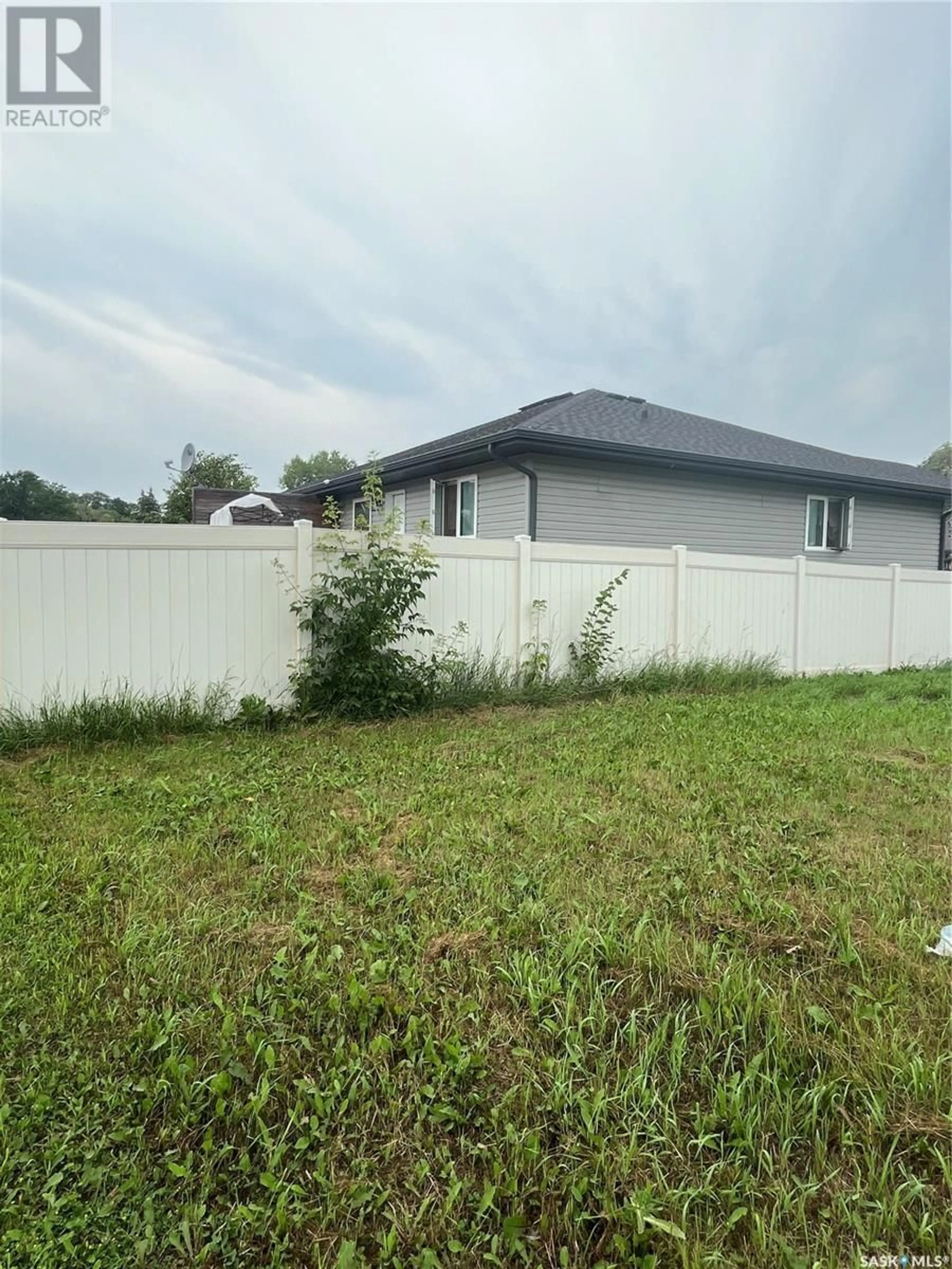 Fenced yard for 28 74 Cameron WAY, Yorkton Saskatchewan S3N2X3