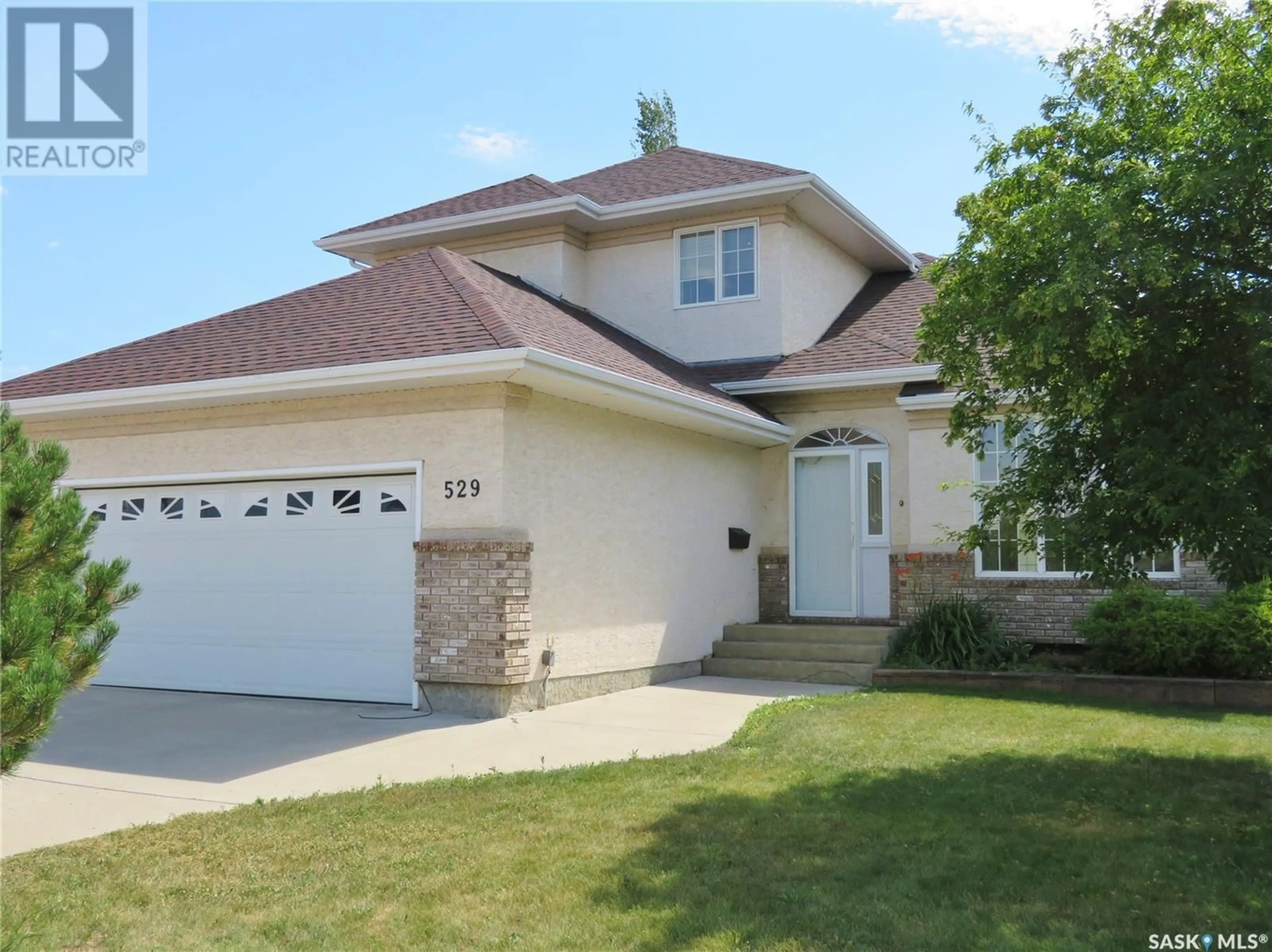 Frontside or backside of a home for 529 King CRESCENT, Warman Saskatchewan S0K4S0