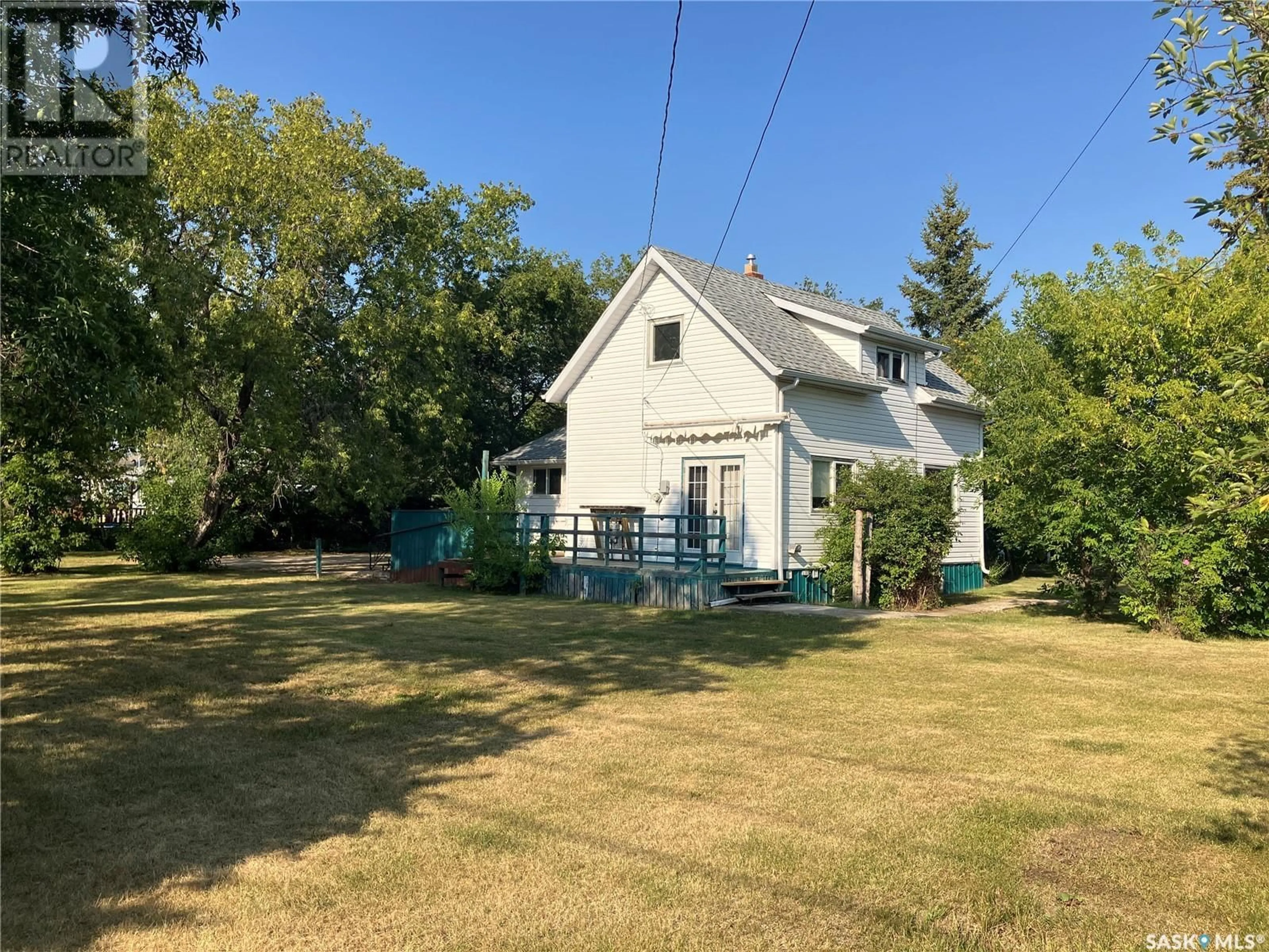 Home with vinyl exterior material, street for 300 5TH STREET, Nipawin Saskatchewan S0E1E0