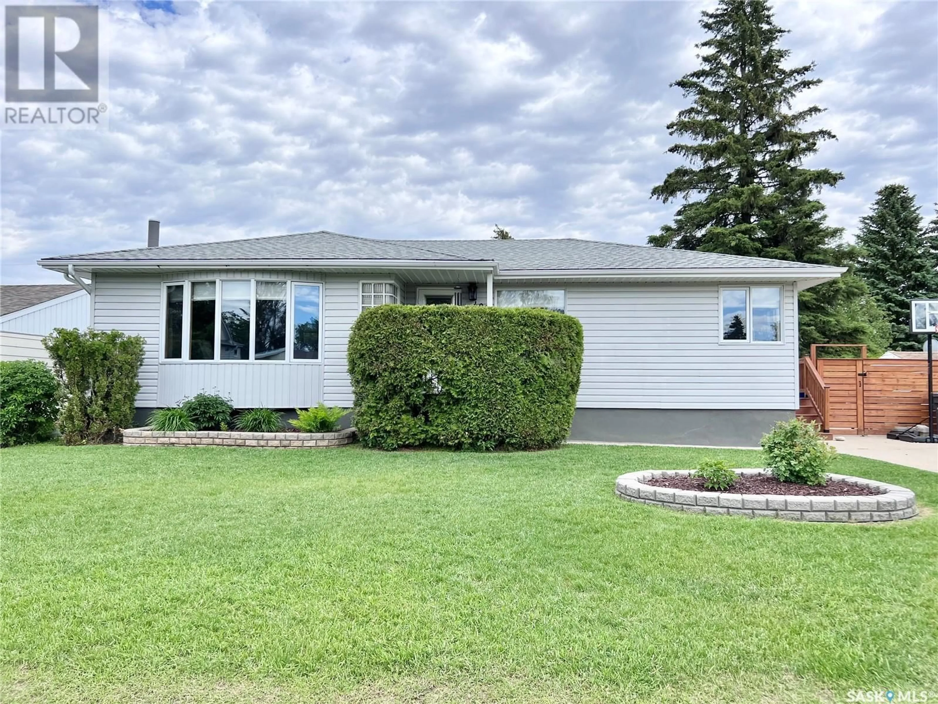 Frontside or backside of a home for 409 Thomson STREET, Outlook Saskatchewan S0L2N0