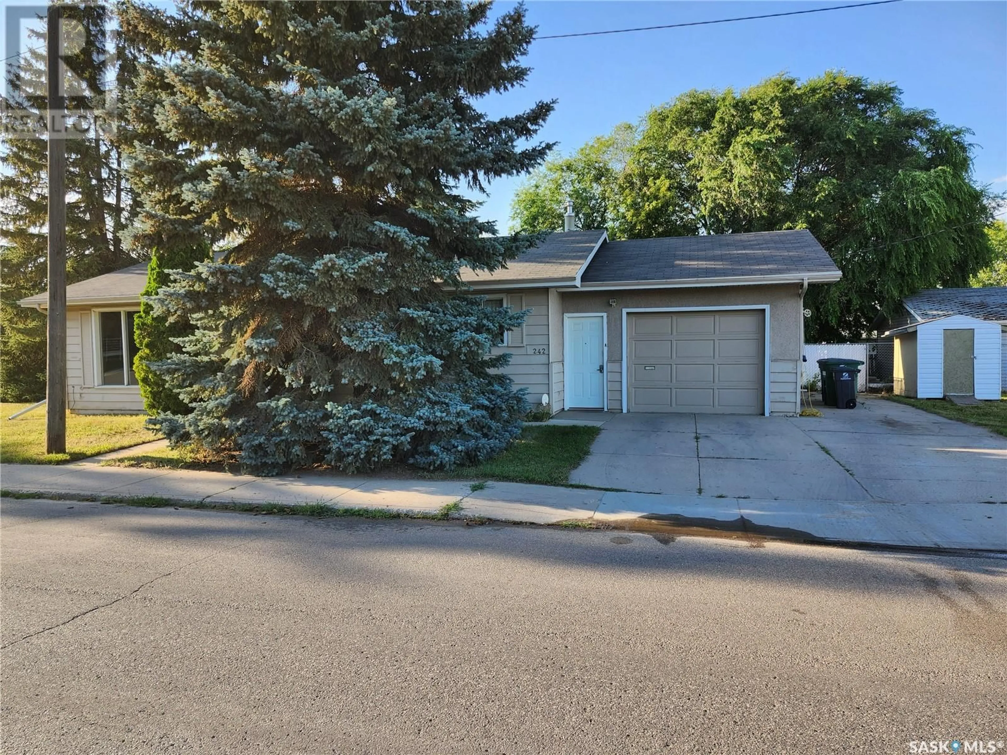 Frontside or backside of a home for 242 Y AVENUE S, Saskatoon Saskatchewan S7M3J5