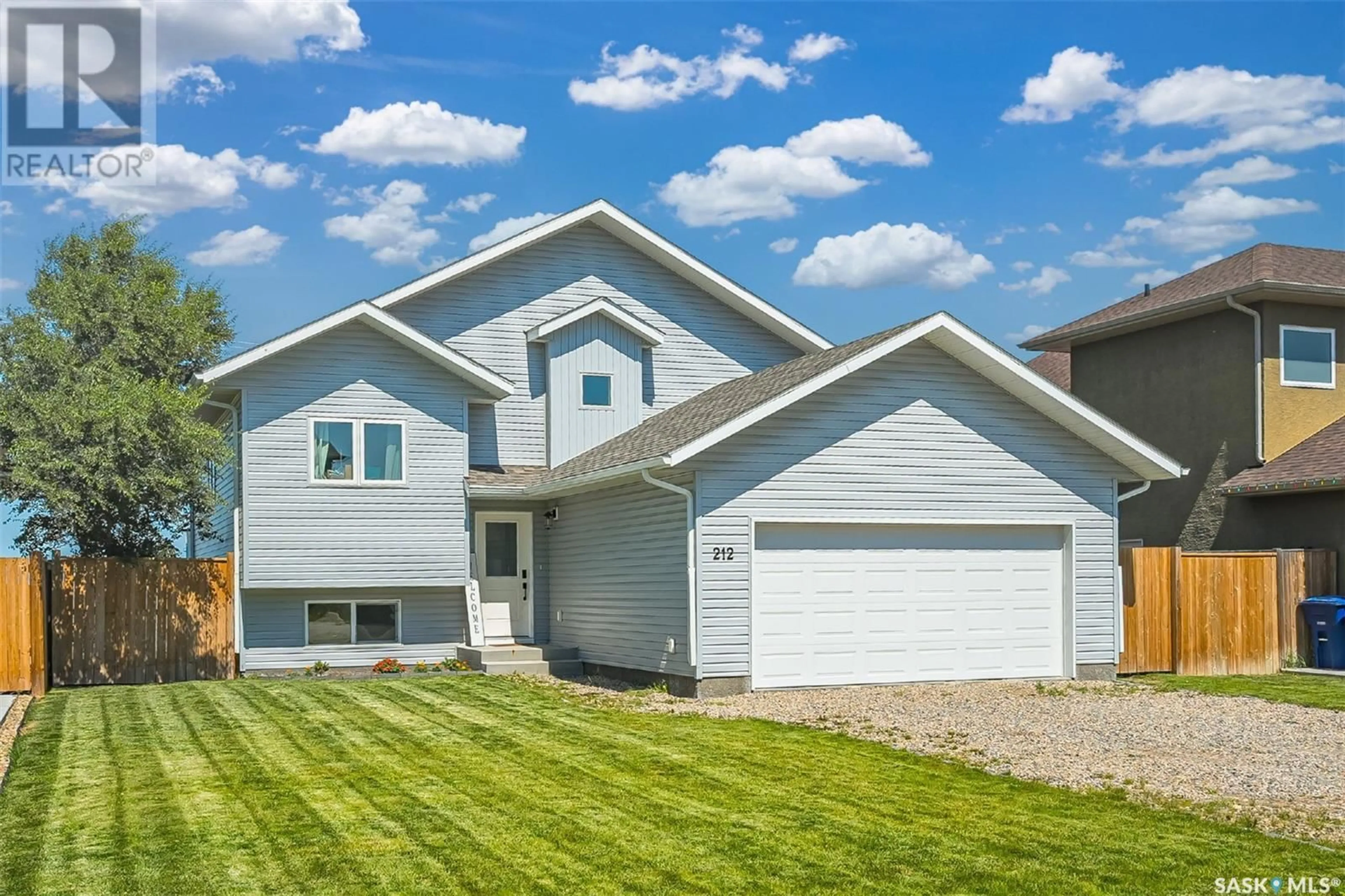 Home with vinyl exterior material for 212 Willard DRIVE, Vanscoy Saskatchewan S0L3J0