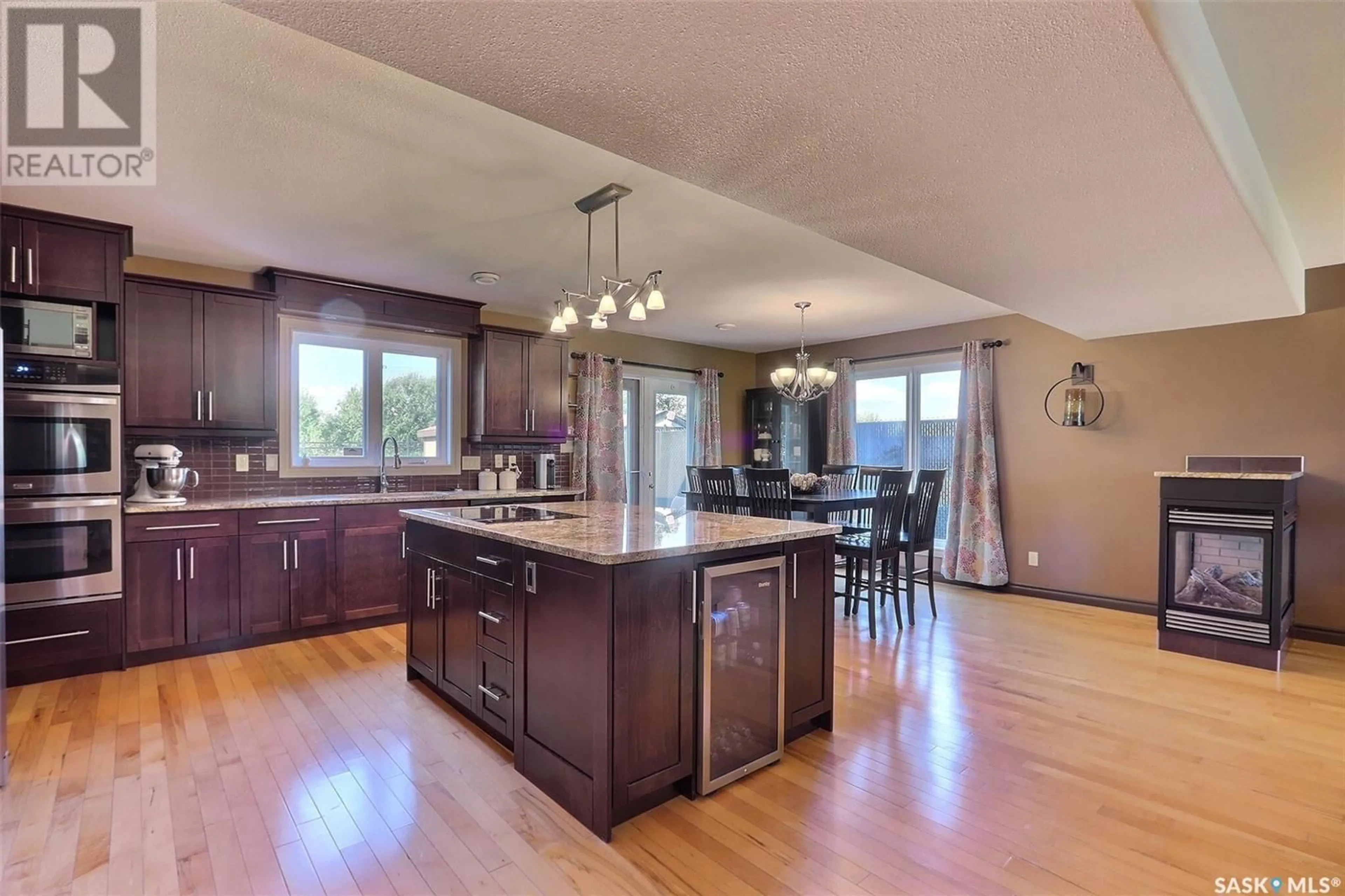 Open concept kitchen, wood/laminate floor for 40 GUY DRIVE, Prince Albert Saskatchewan S6X0A3