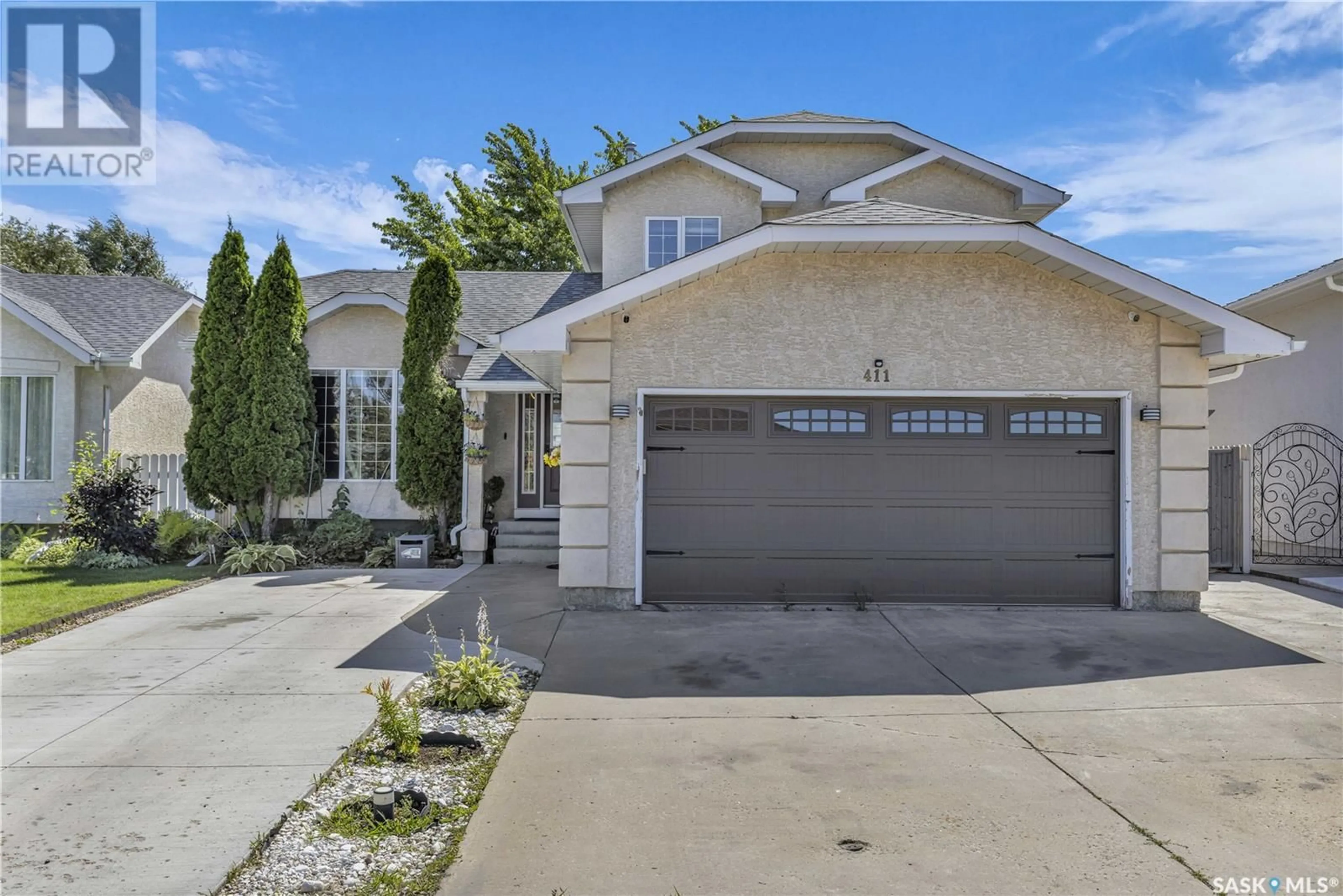 Frontside or backside of a home for 411 Blackshire CRESCENT, Saskatoon Saskatchewan S7V1B4