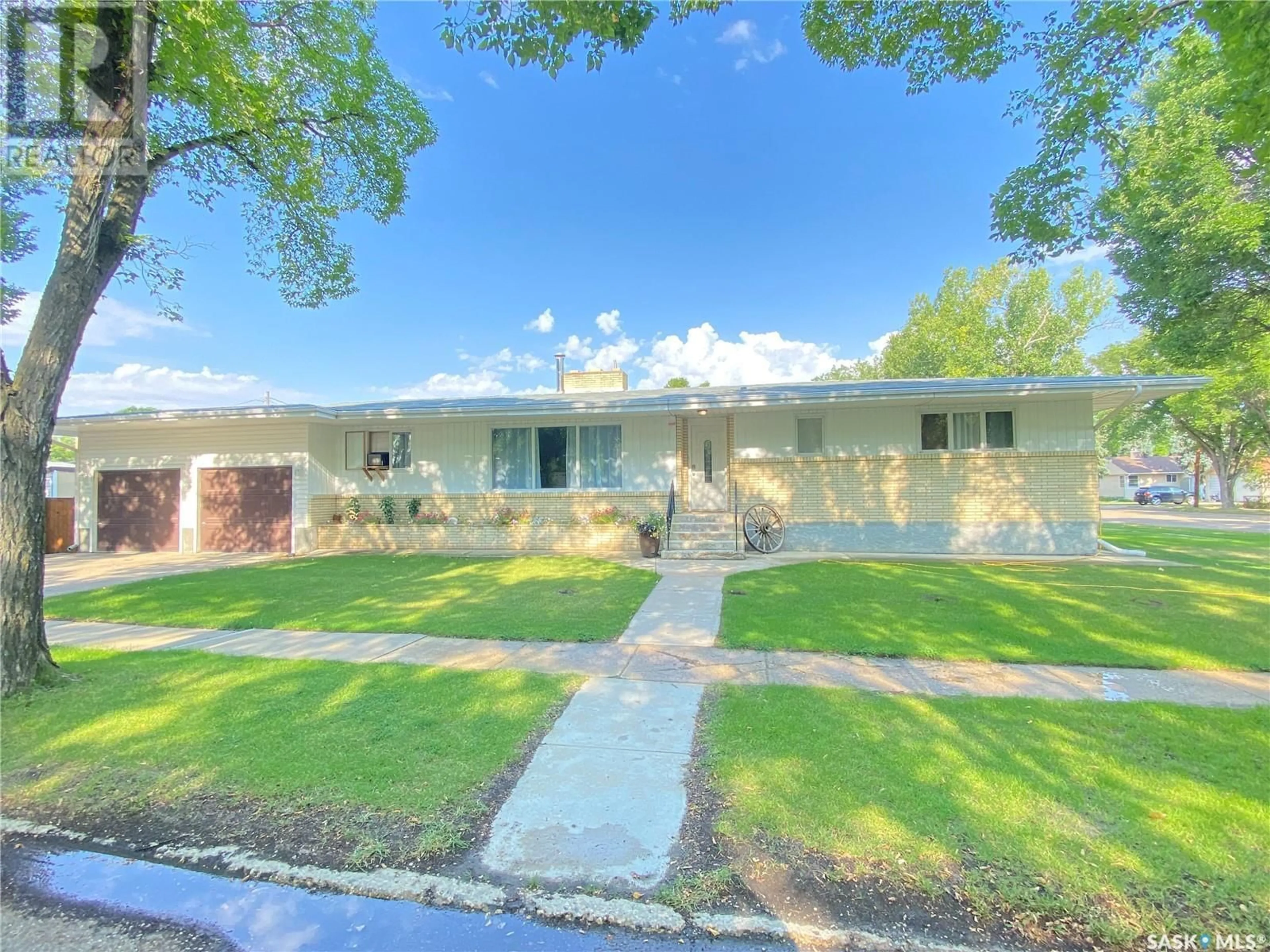 A pic from outside/outdoor area/front of a property/back of a property/a pic from drone, street for 301 ASPEN STREET, Maple Creek Saskatchewan S0N1N0