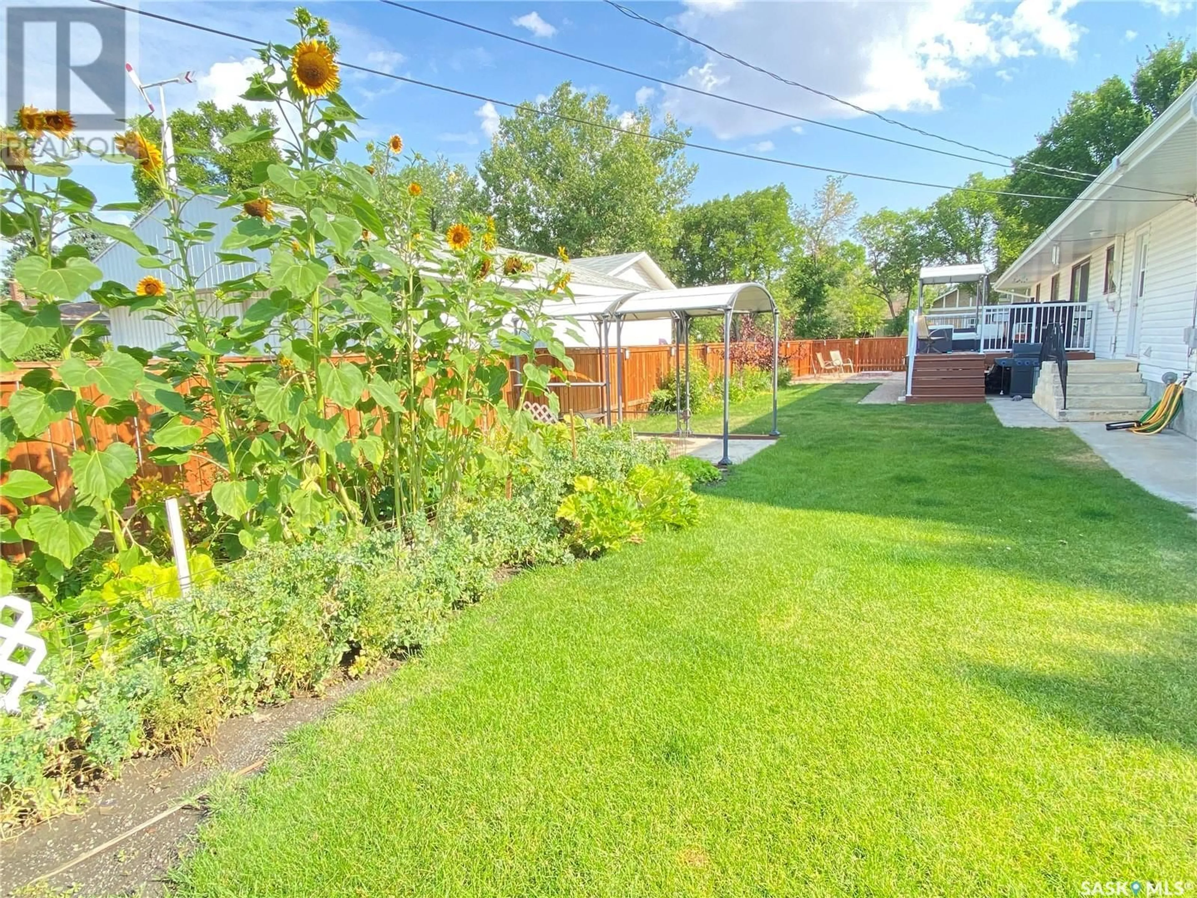 A pic from outside/outdoor area/front of a property/back of a property/a pic from drone, street for 301 ASPEN STREET, Maple Creek Saskatchewan S0N1N0