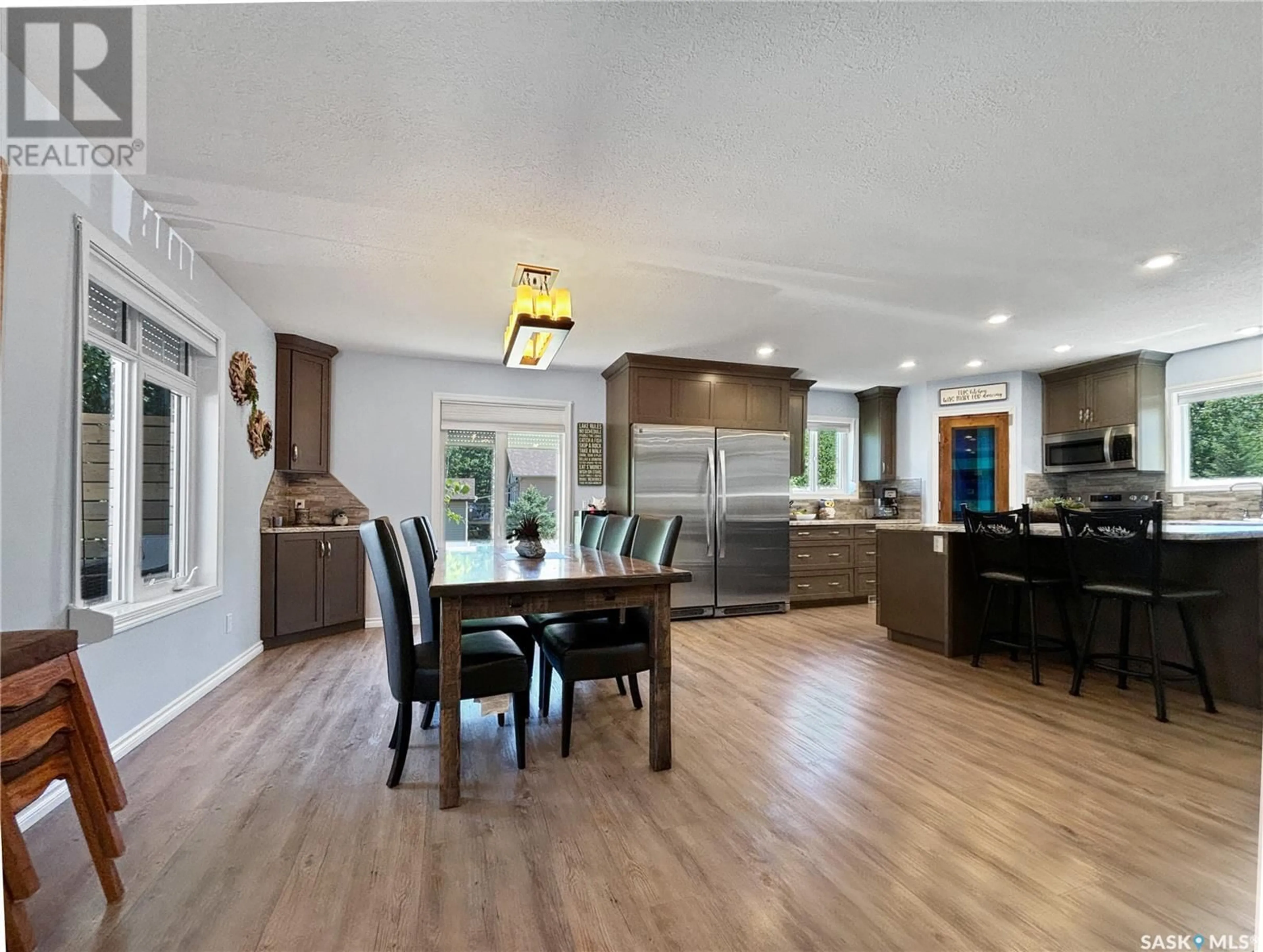 Open concept kitchen, wood/laminate floor for lot 11 and 1/2 of lot 10 - 32 MINISTIKWAN ROAD, Loon Lake Rm No. 561 Saskatchewan S0M1L0