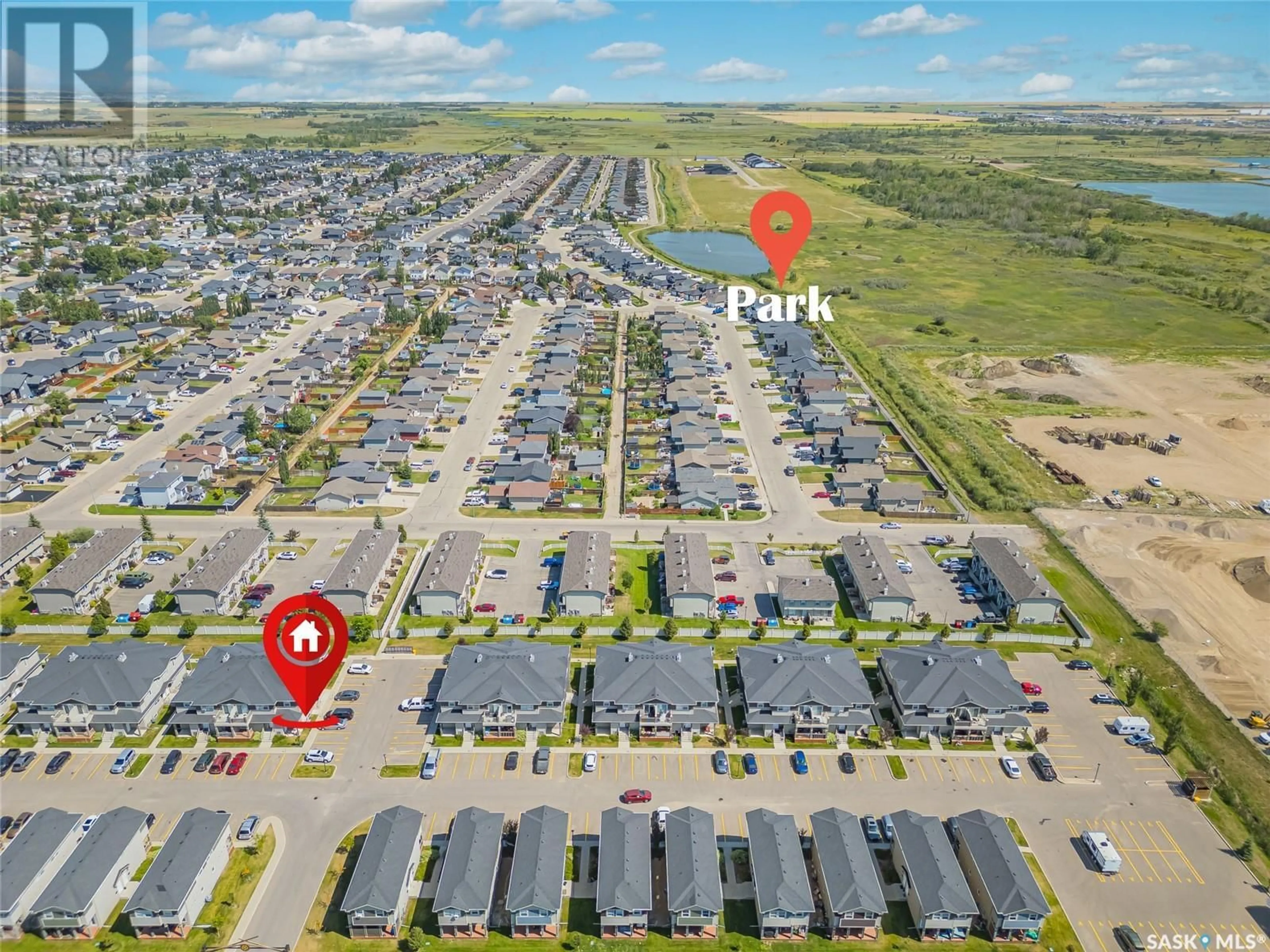 A pic from exterior of the house or condo, the street view for 205 100 Chaparral BOULEVARD, Martensville Saskatchewan S0K0A2