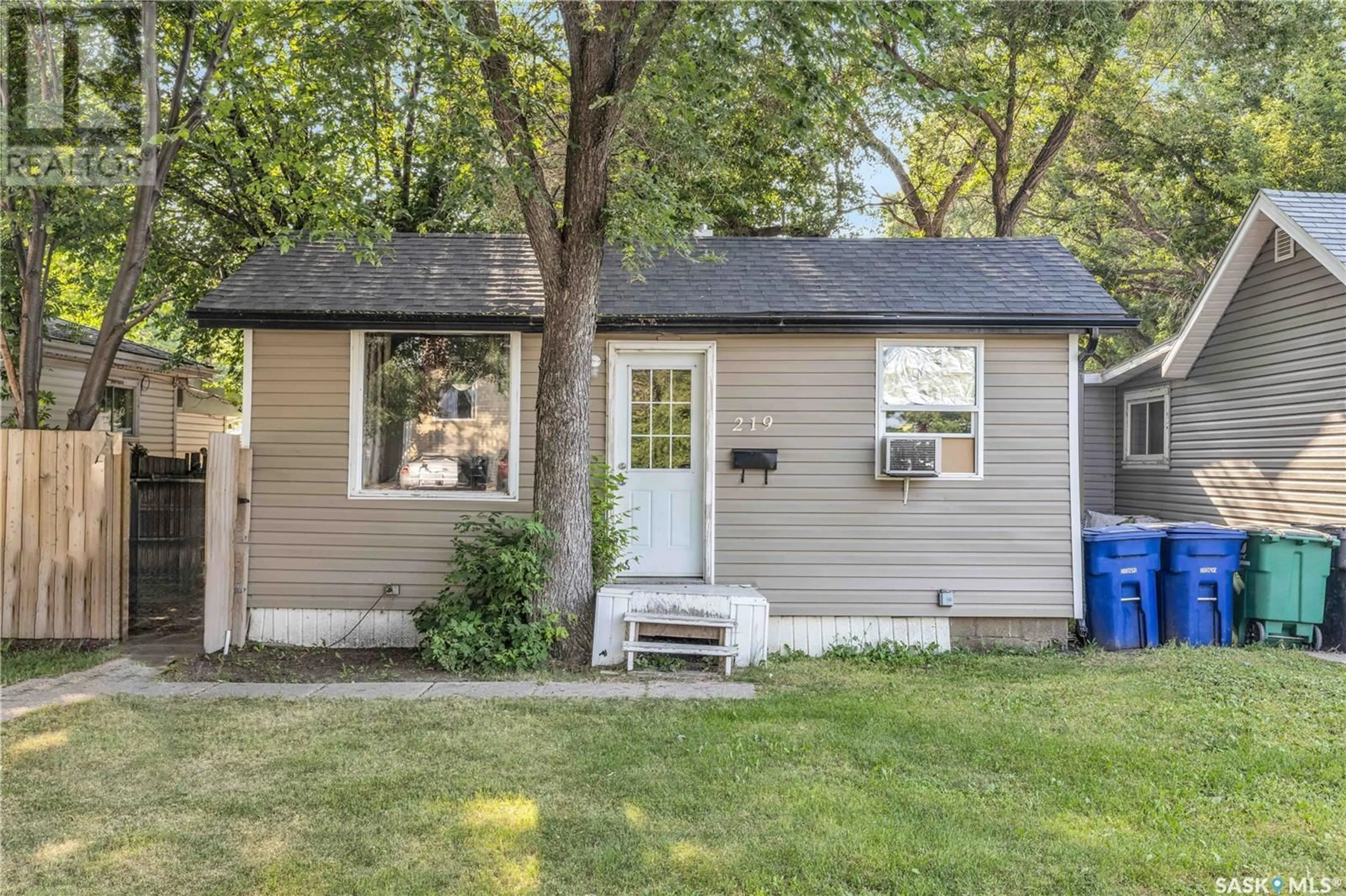 Home with vinyl exterior material, street for 219 Y AVENUE, Saskatoon Saskatchewan S7M3J4
