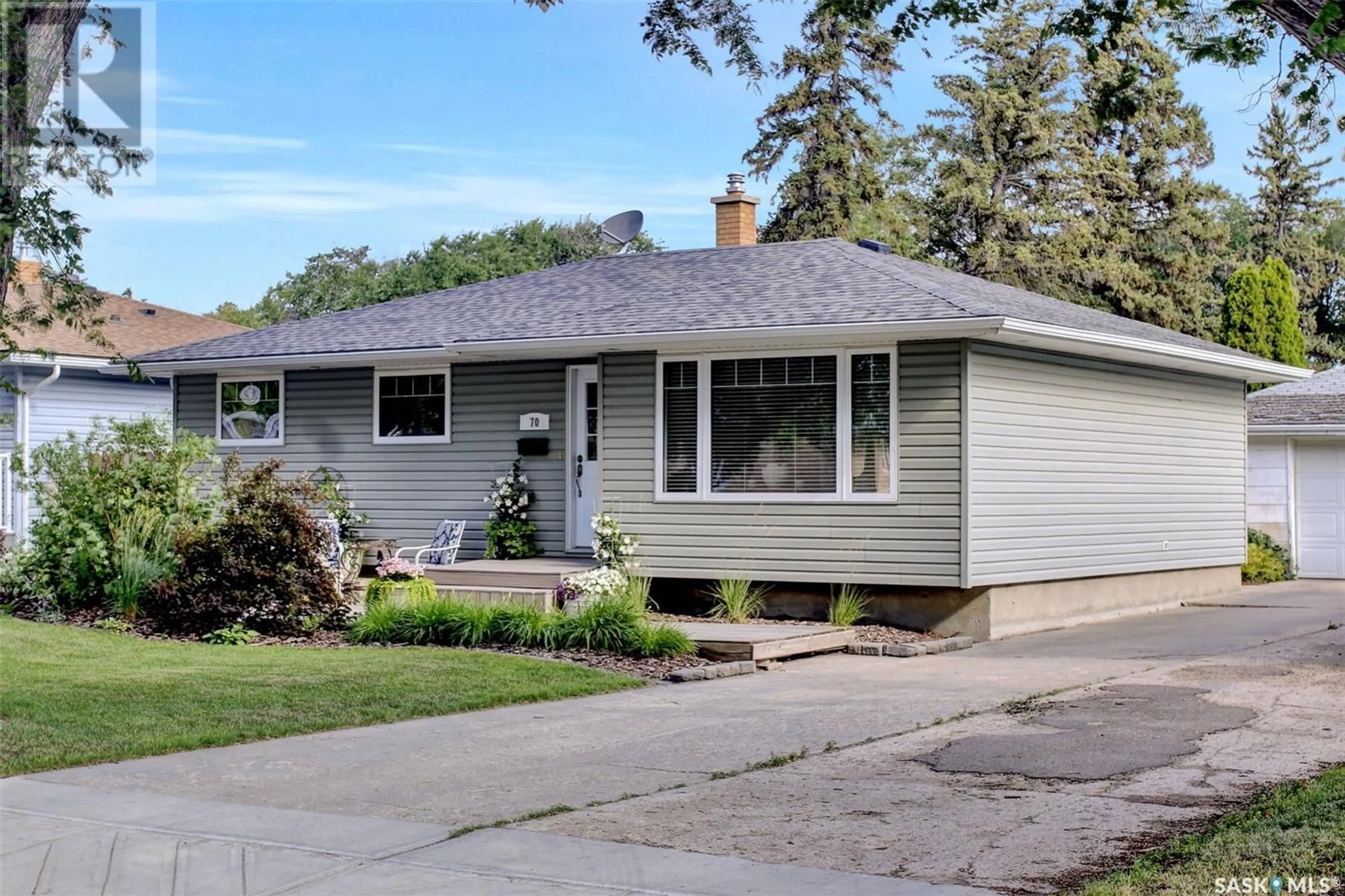 Home with vinyl exterior material for 70 McMurchy AVENUE, Regina Saskatchewan S4R3G4