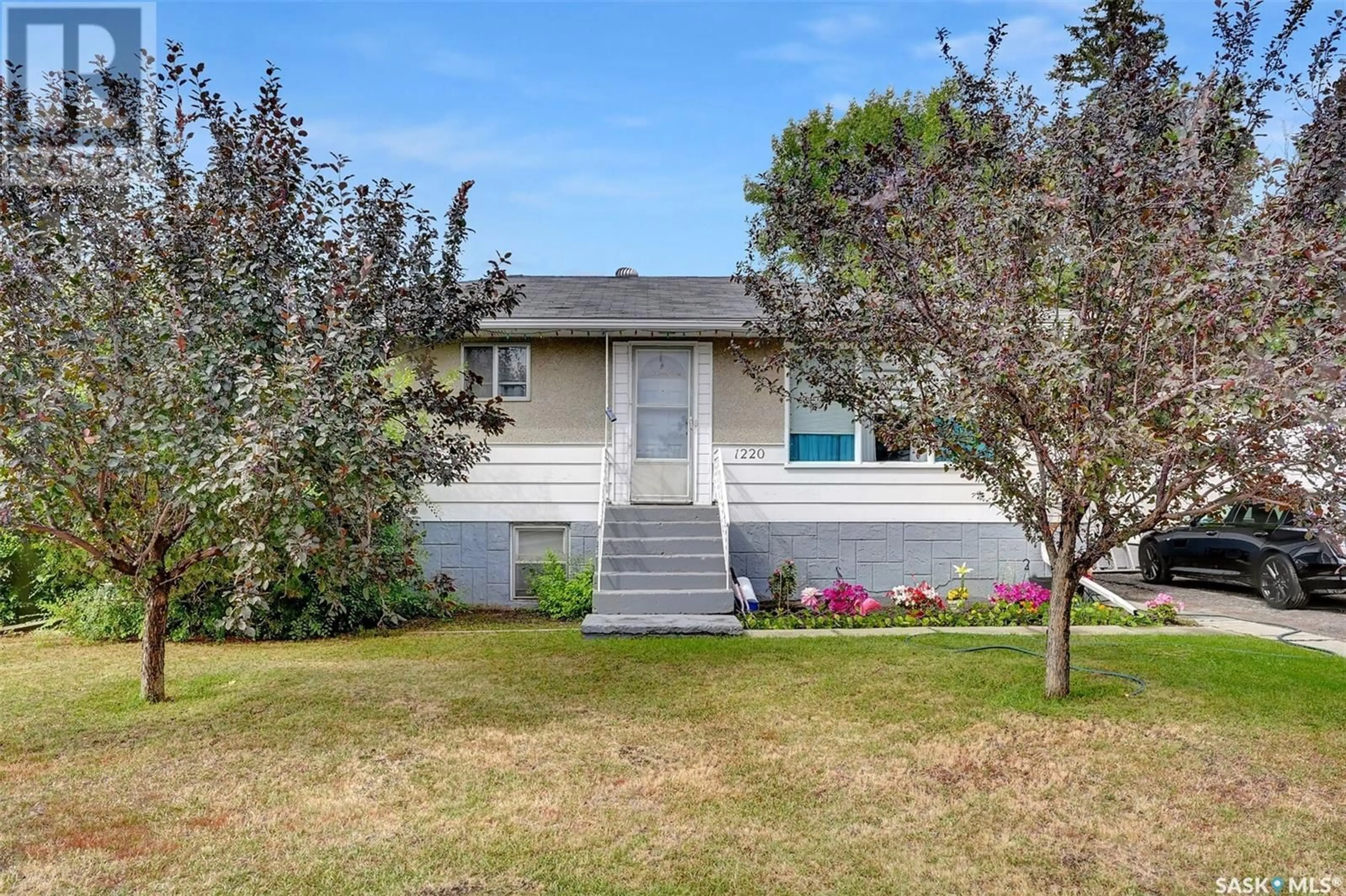 Home with vinyl exterior material, street for 1220 DEWDNEY AVENUE, Regina Saskatchewan S4N0E3