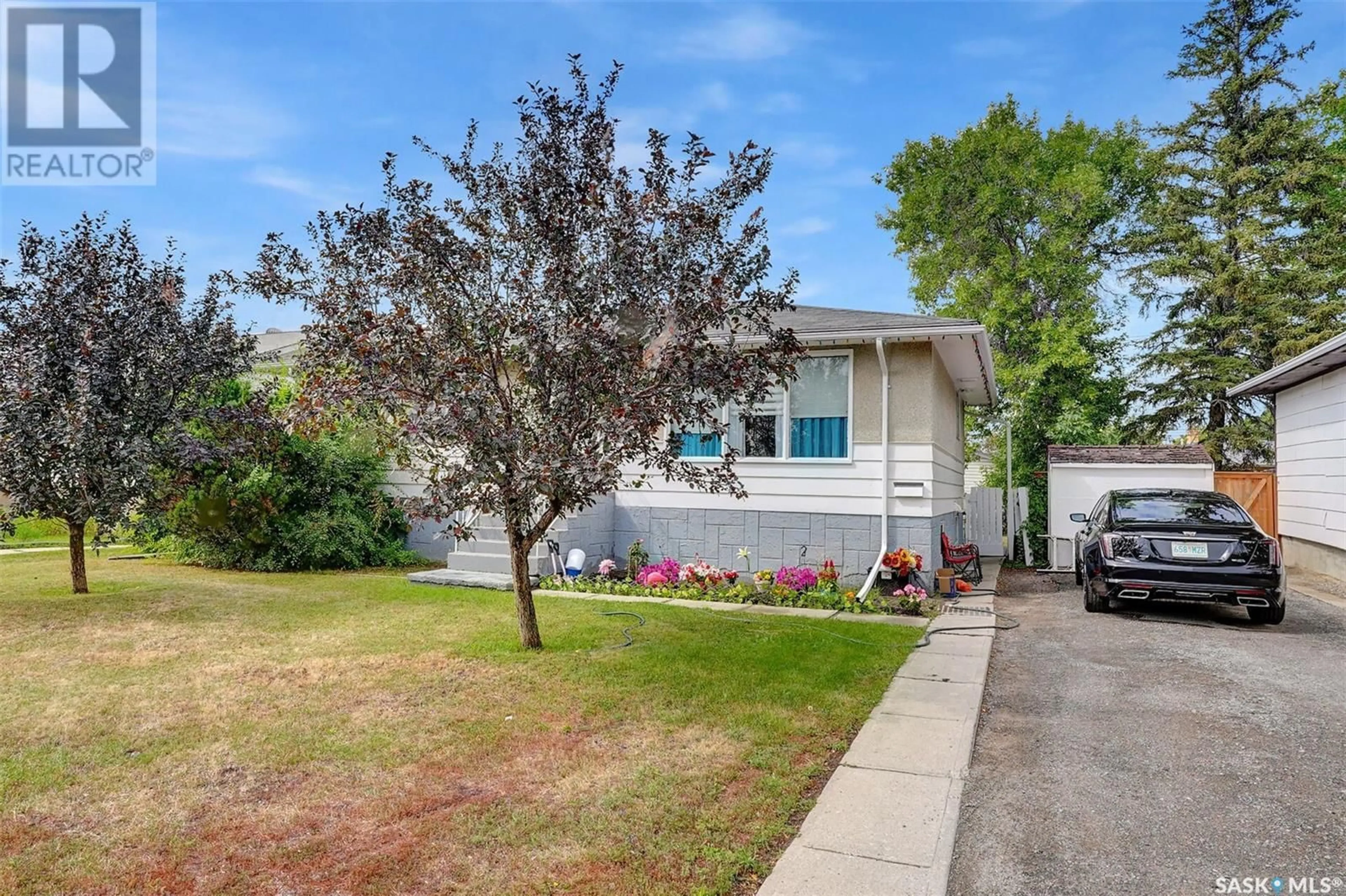 Home with vinyl exterior material, street for 1220 DEWDNEY AVENUE, Regina Saskatchewan S4N0E3
