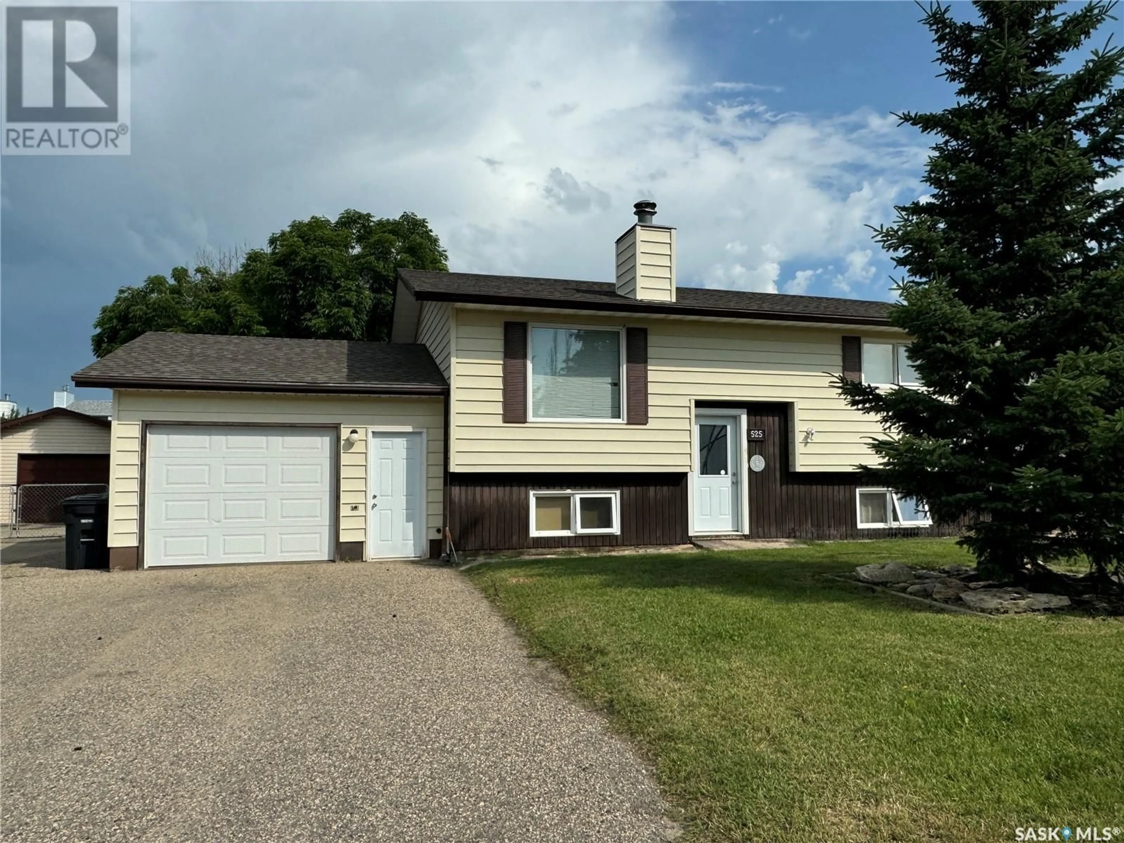 Frontside or backside of a home for 525 8th AVENUE W, Biggar Saskatchewan S0K0M0