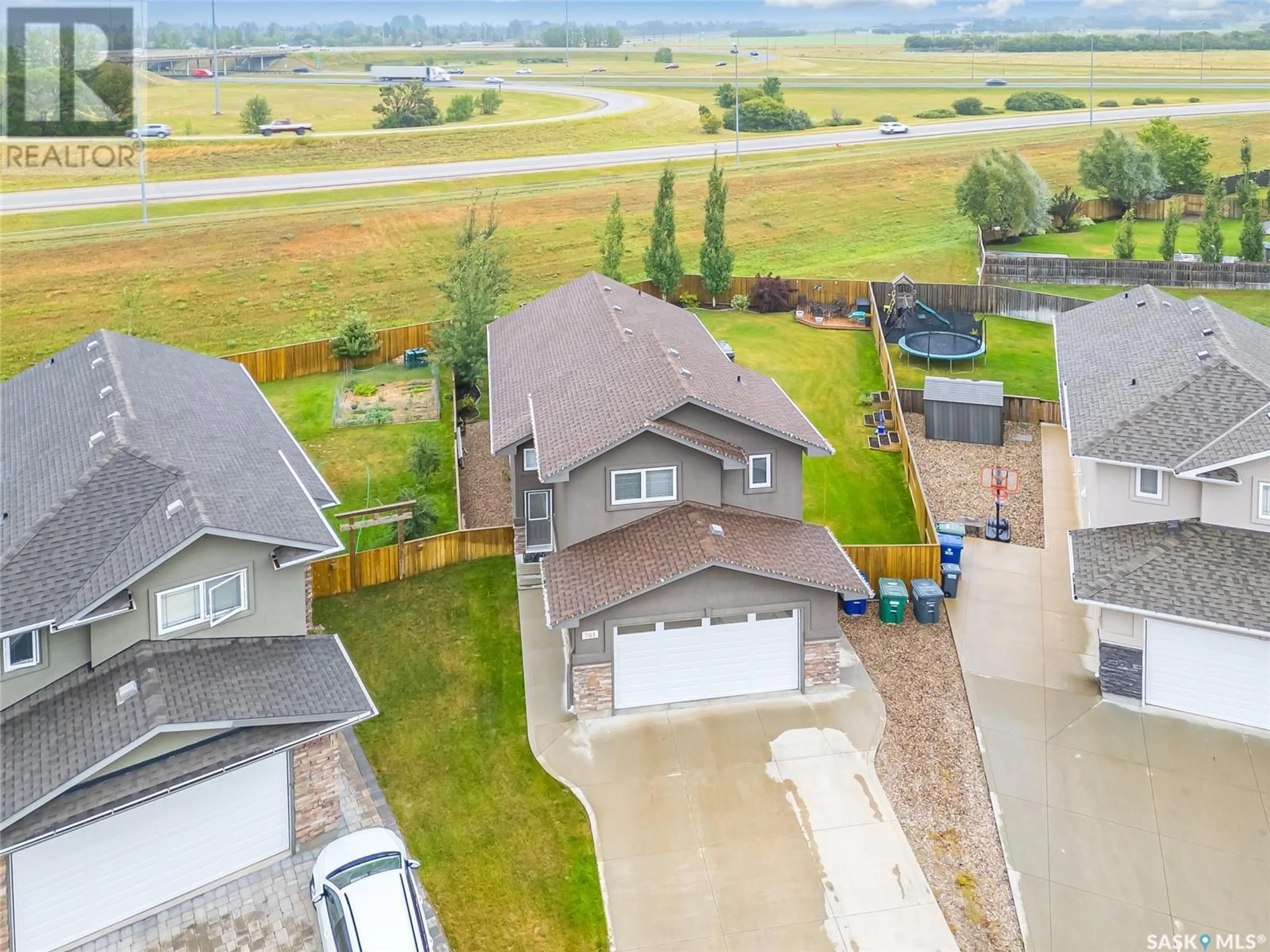 Frontside or backside of a home for 761 Rempel COVE, Saskatoon Saskatchewan S7T0M4