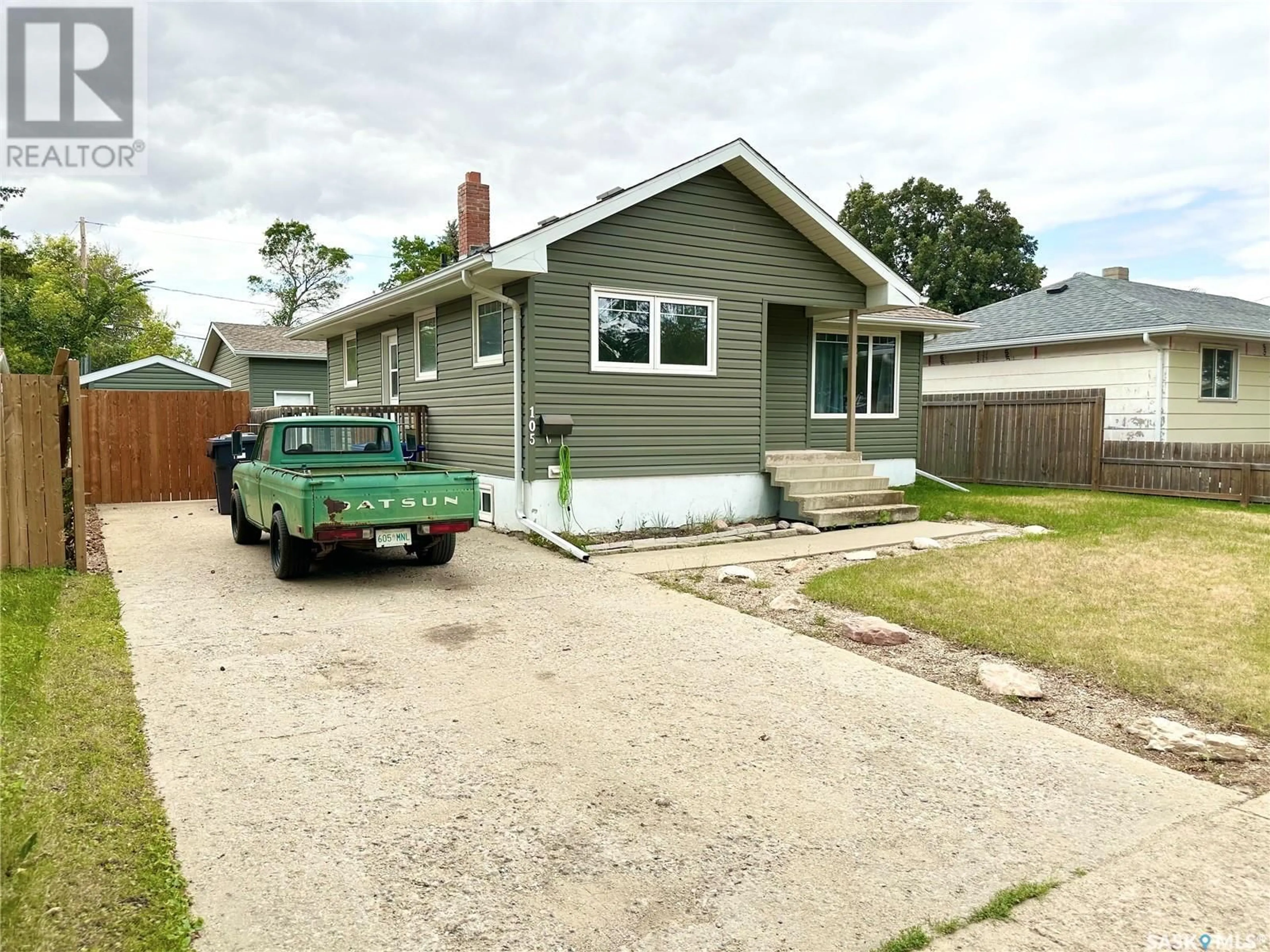 Frontside or backside of a home for 105 11th STREET NE, Weyburn Saskatchewan S4H1J4