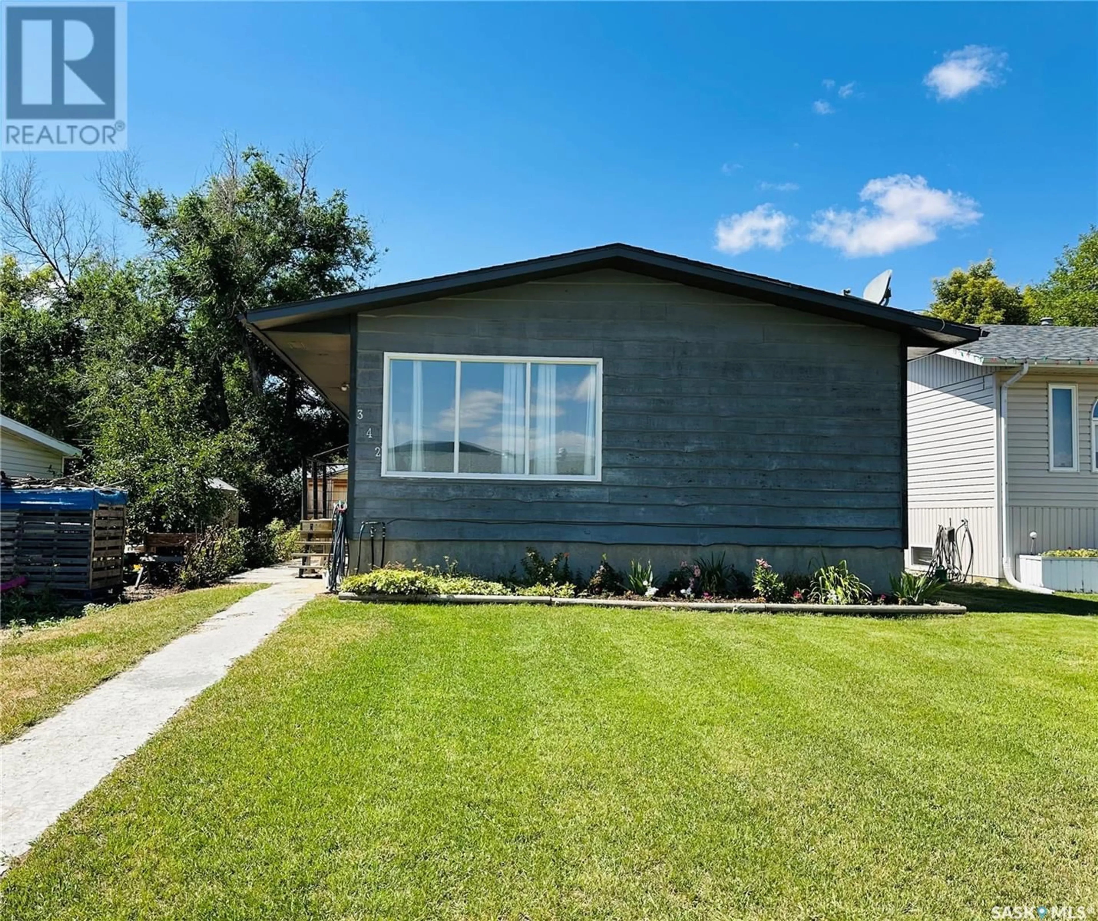 Frontside or backside of a home for 342 7th AVENUE SE, Swift Current Saskatchewan S9H3P7