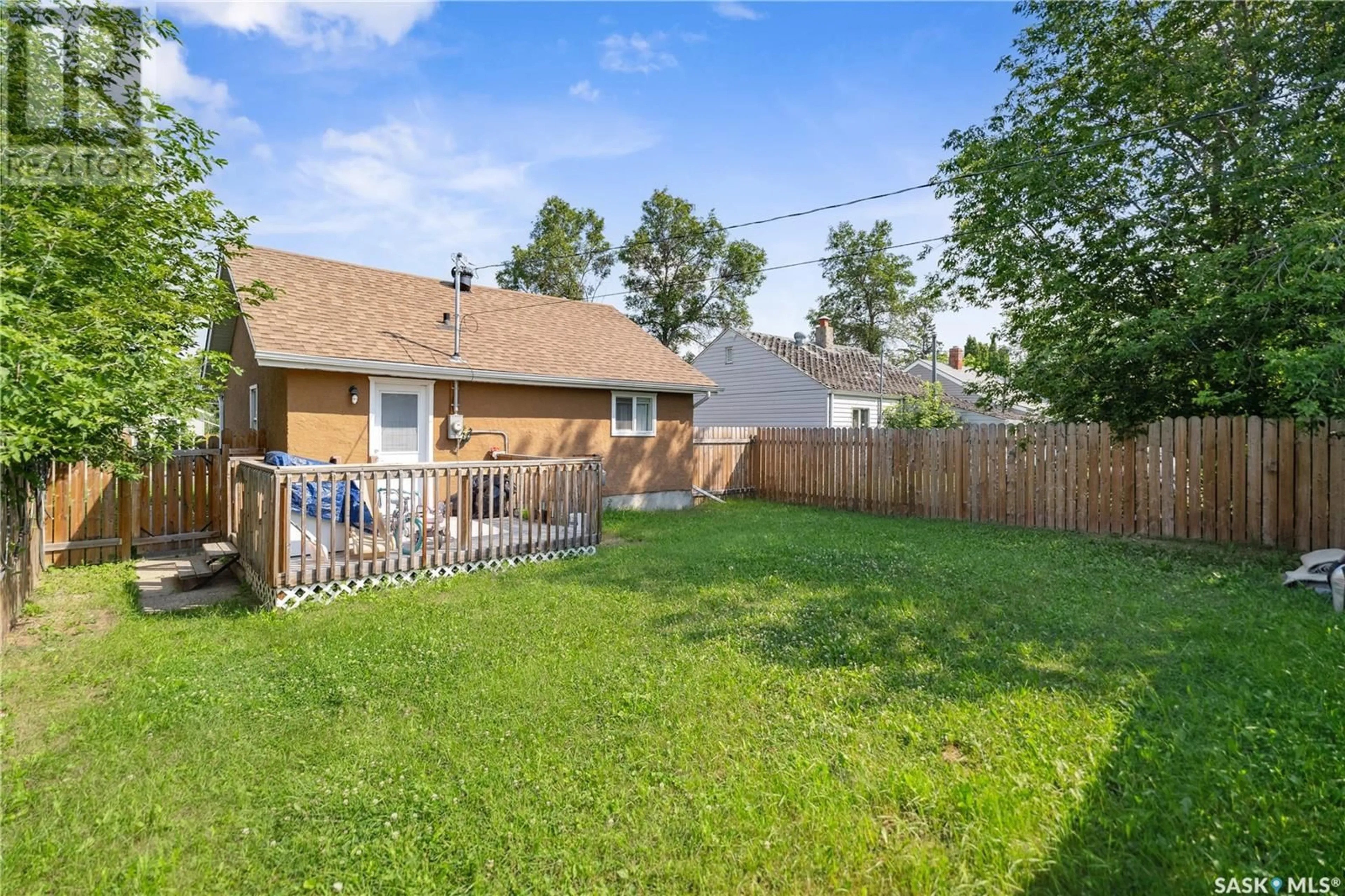 Frontside or backside of a home, the fenced backyard for 341 7th STREET E, Prince Albert Saskatchewan S6V0S1