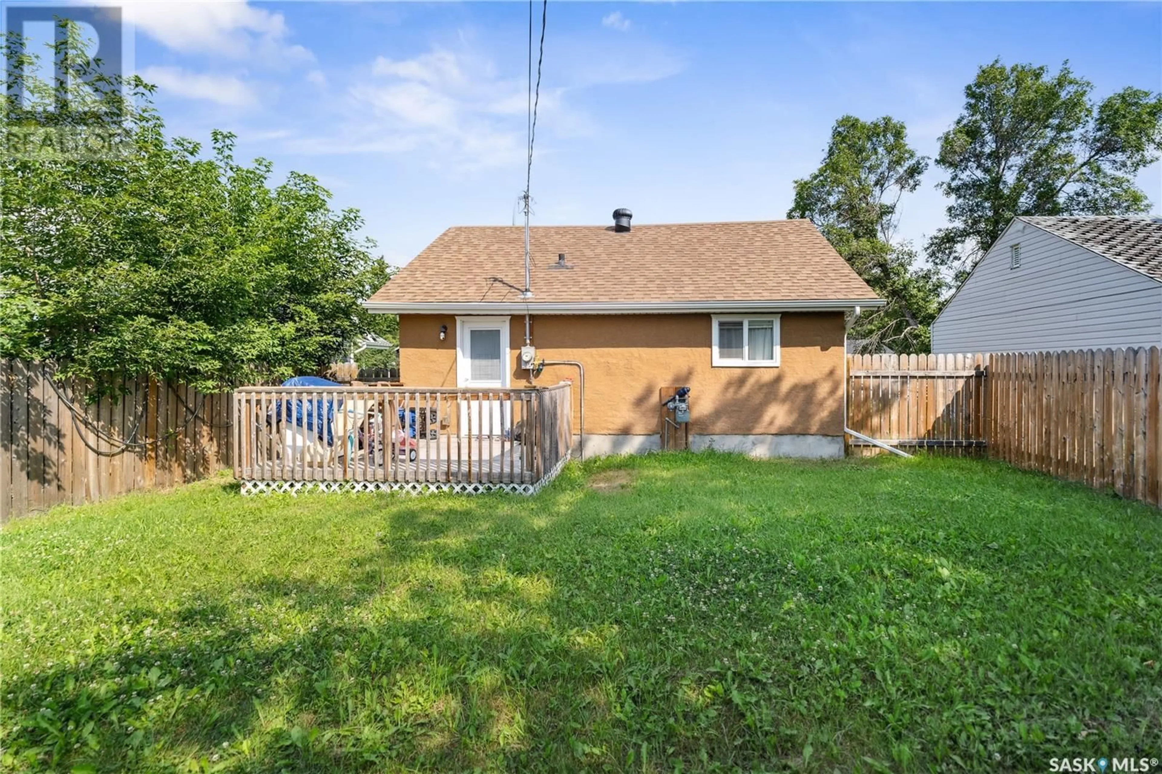 Frontside or backside of a home, the fenced backyard for 341 7th STREET E, Prince Albert Saskatchewan S6V0S1