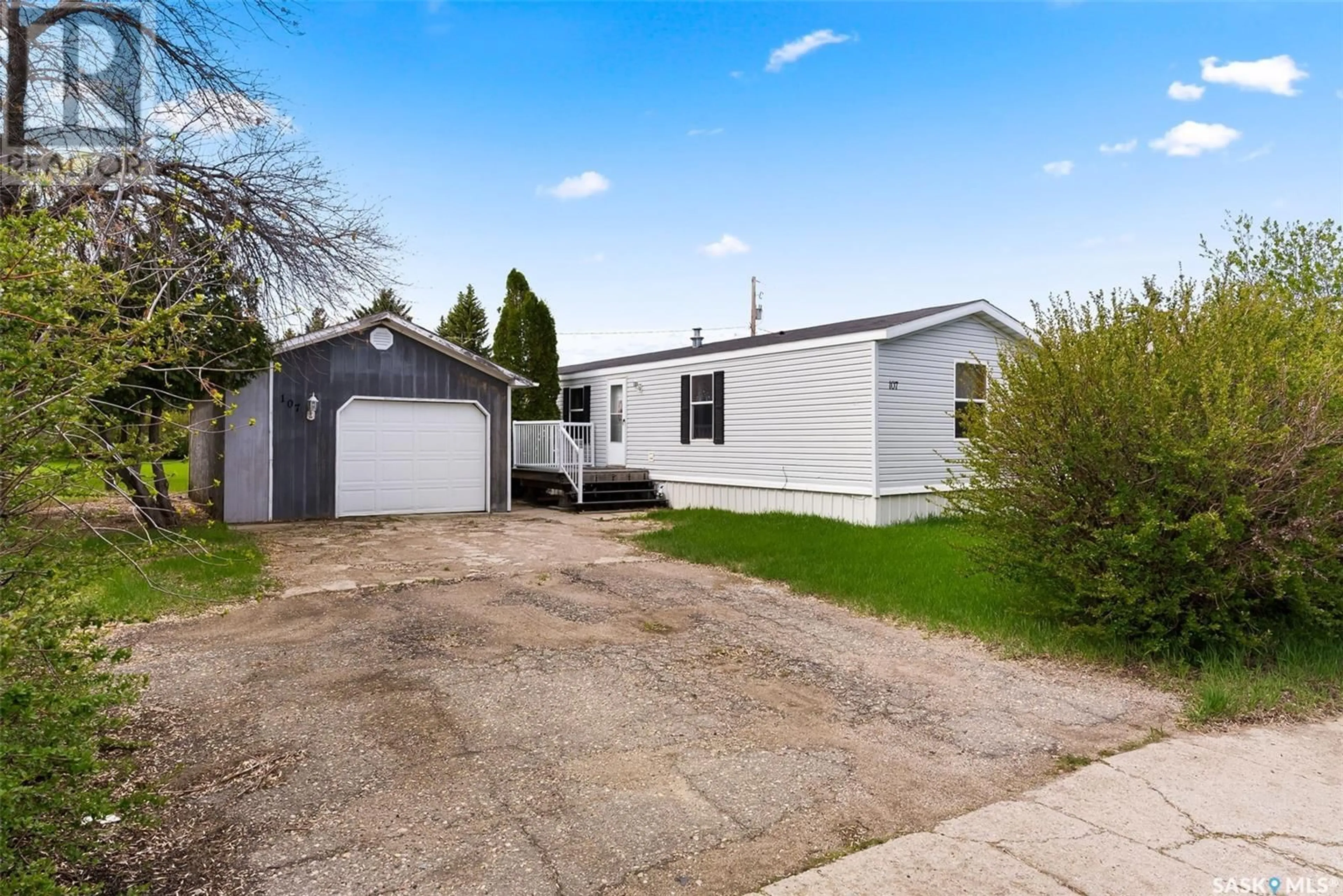 Frontside or backside of a home for 107 MacLean STREET, Raymore Saskatchewan S0A3J0