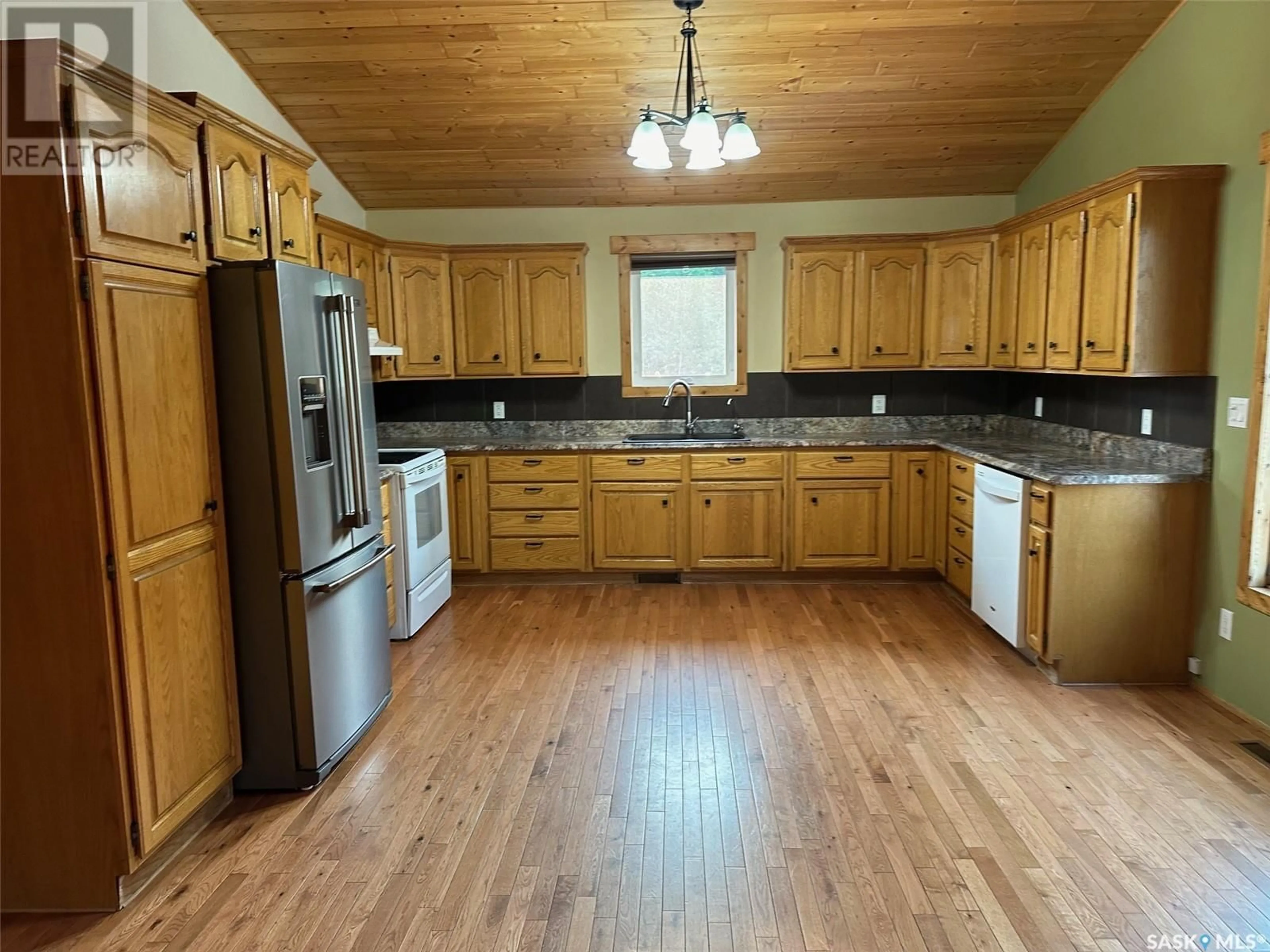 Kitchen, wood floors, cottage for 1511 Minayik CRESCENT, Lac La Ronge Saskatchewan S0J3G0