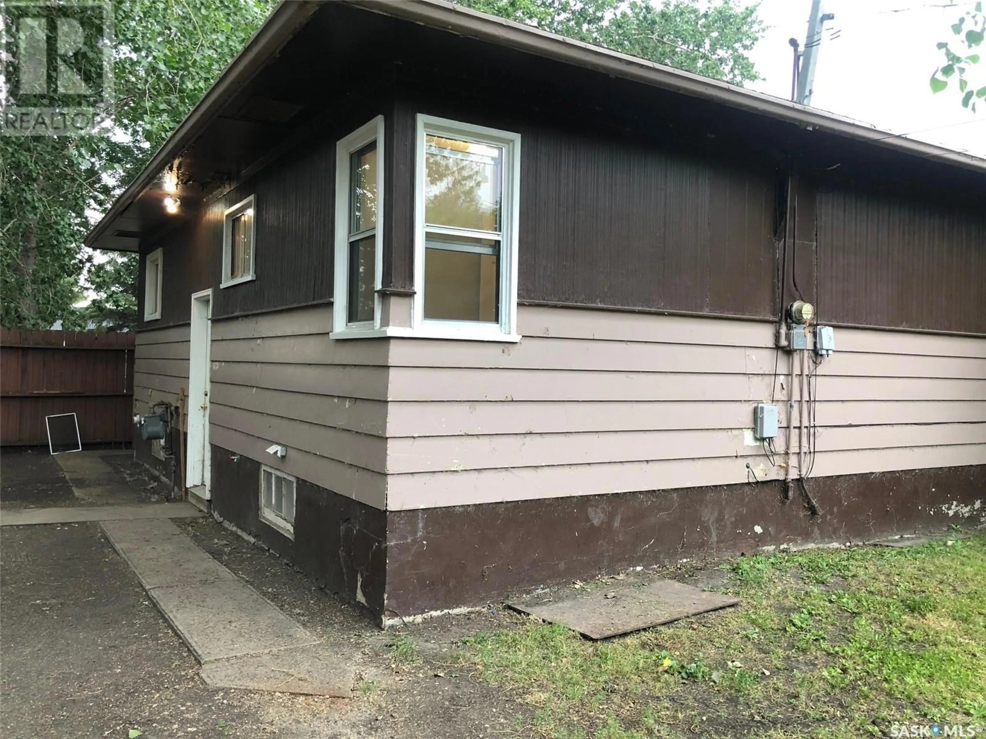 Home with vinyl exterior material for 159 Assiniboine TERRACE, Kamsack Saskatchewan S0A1S0